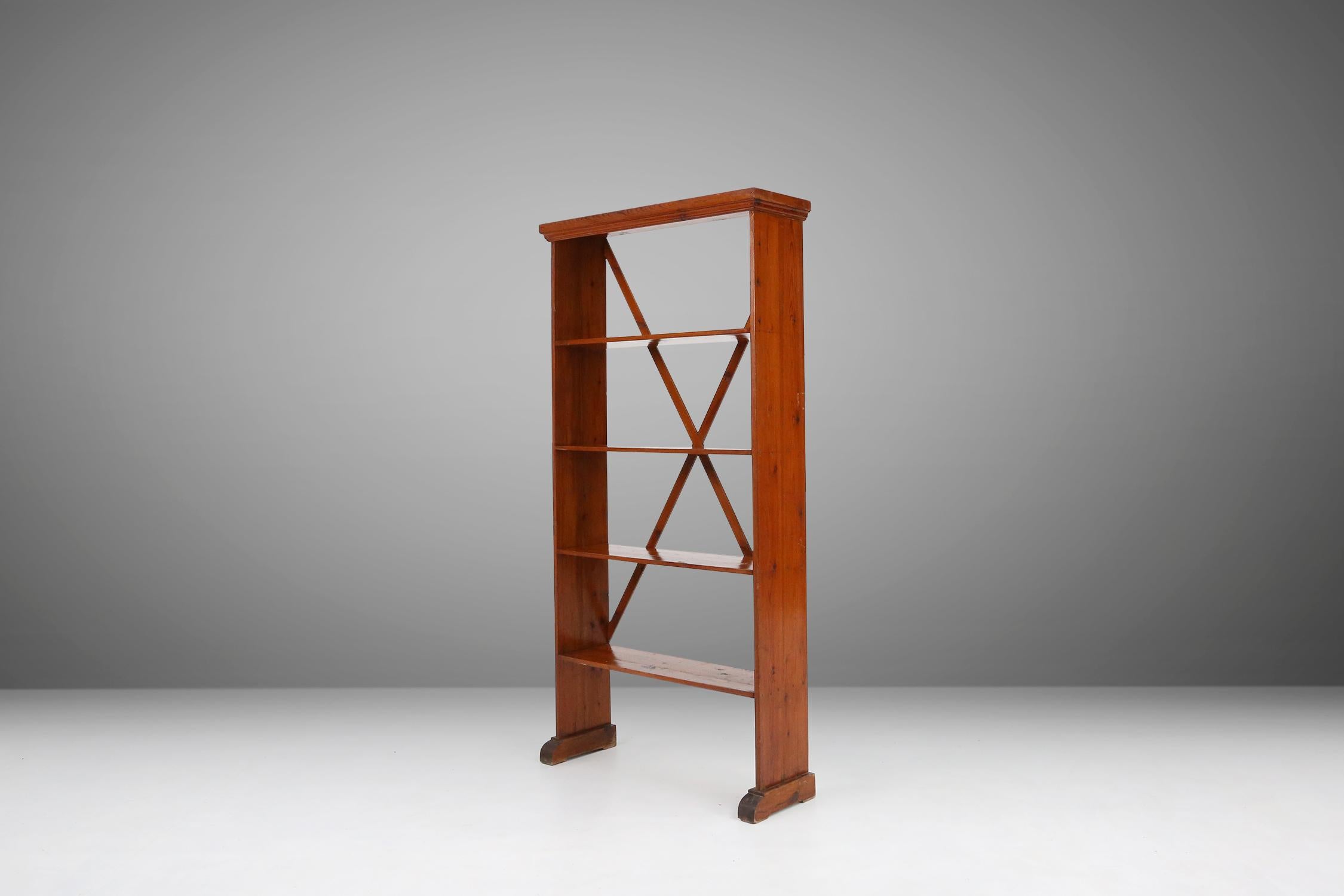 Mid-century bookcase or shelve made of sold pine wood in the 1920 in France. Very practical and decorative. Has some nice patina on the wood.