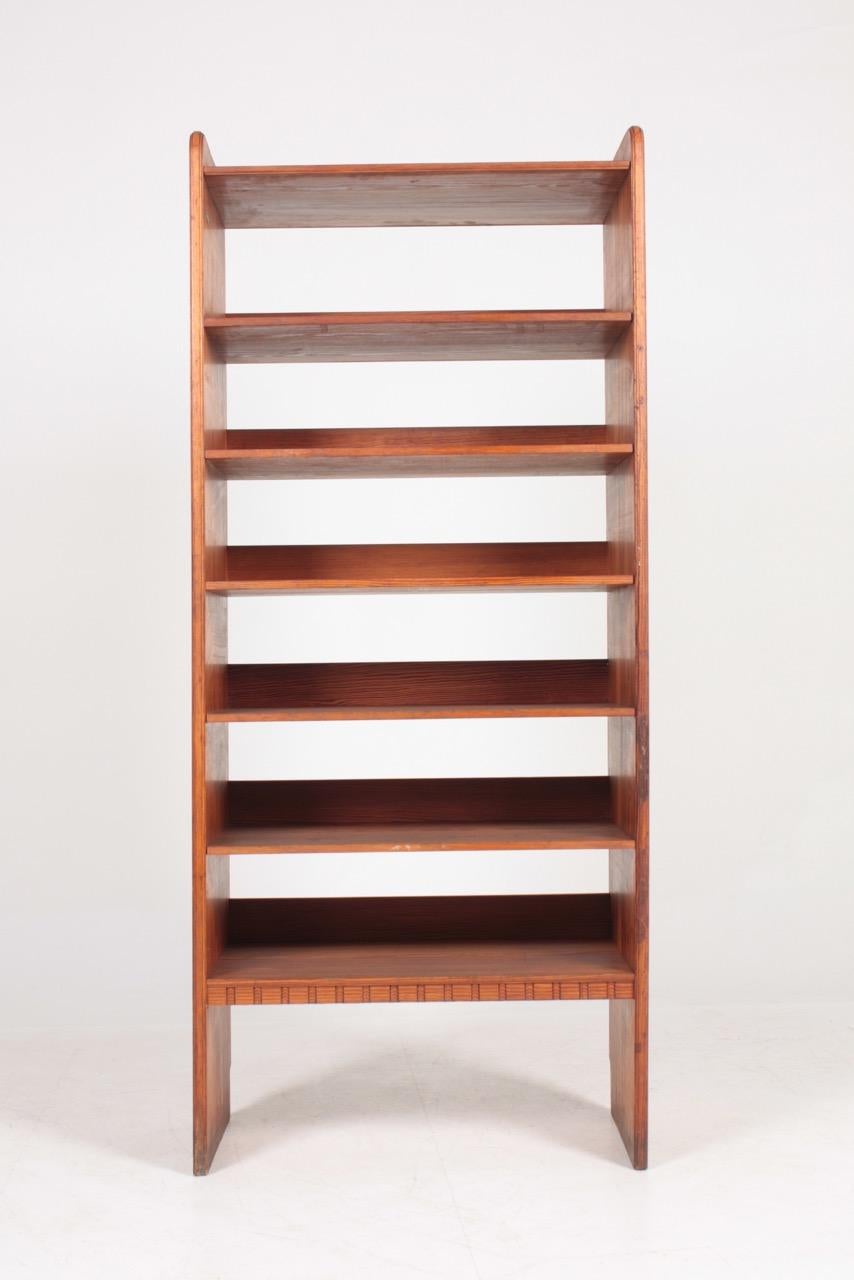 Bookcase in patinated solid pine. Designed by MAA. Martin Nyrop as interior for Copenhagen town hall in 1905. Made in Denmark by Cabinetmaker Rud Rasmussen cabinetmakers. Great original condition.

 