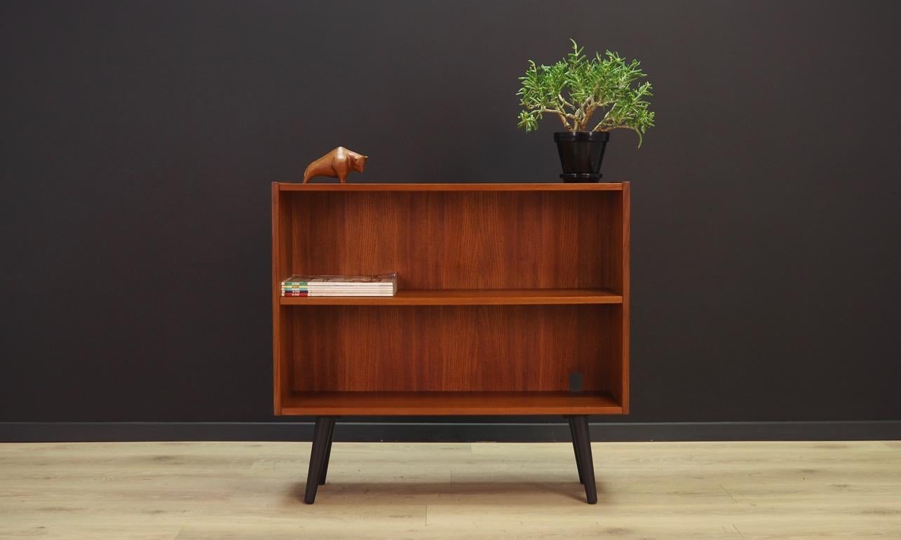 Classic bookcase / library from the 1960s-1970s. Scandinavian design, Minimalist form. Furniture finished with teak veneer. Shelf with adjustable height. At the back hole for cables. Maintained in good condition (minor bruises and scratches),