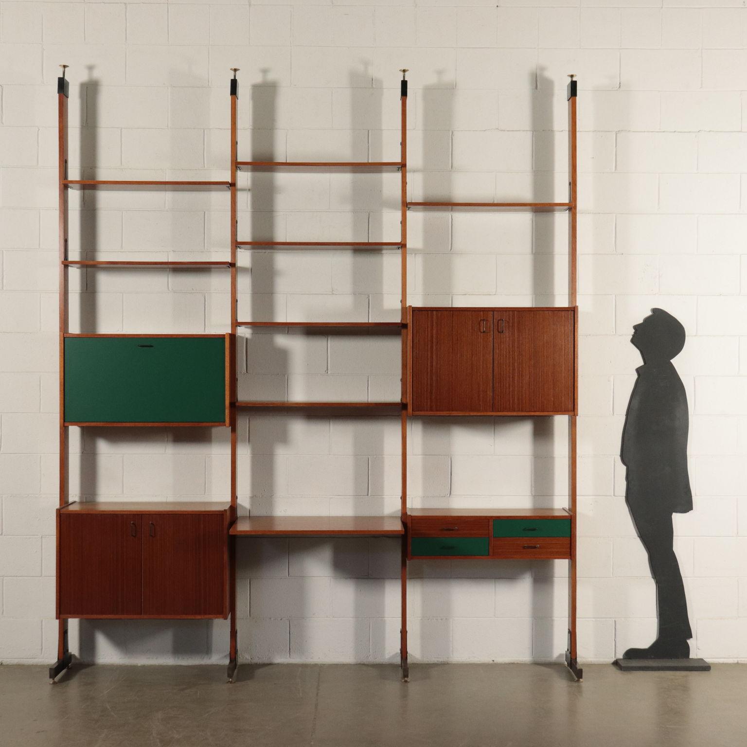 Celing bookcase with adjustable elements, teak veneered wood with fformica inserts, metal and brass legs and ending parts.