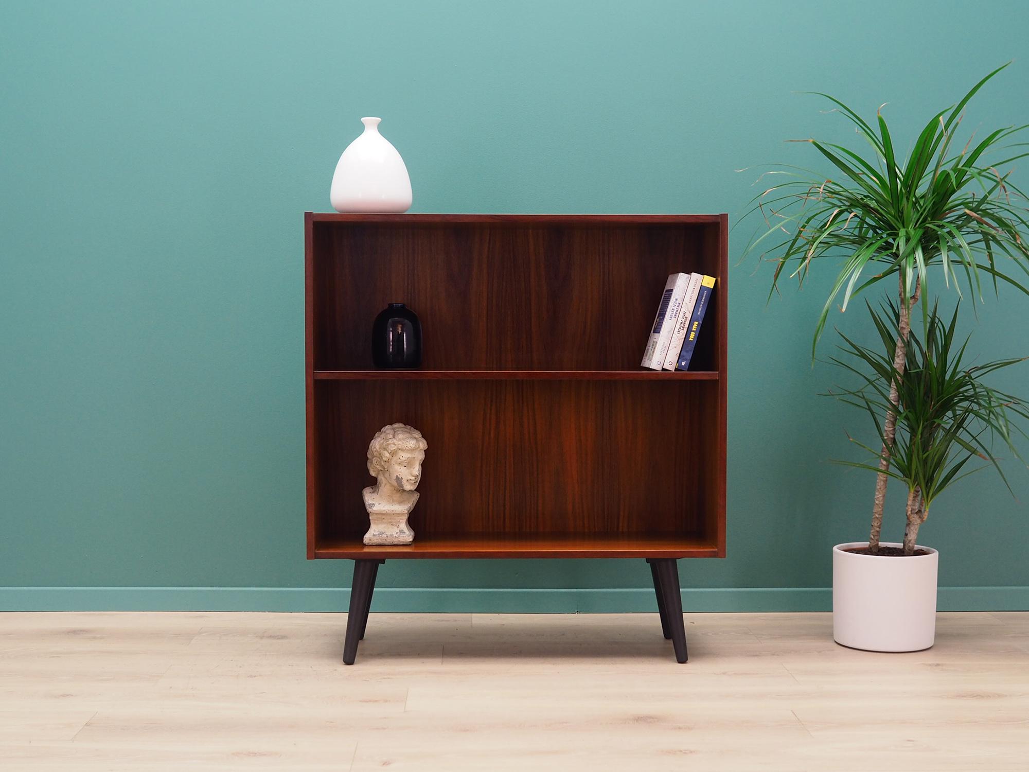 Brilliant bookcase / library from the 1960s-1970s. Scandinavian design, Minimalist form. Surface of the furniture finished with rosewood veneer. Shelf with height adjustment. Preserved in good condition (minor bruises and scratches) - directly for