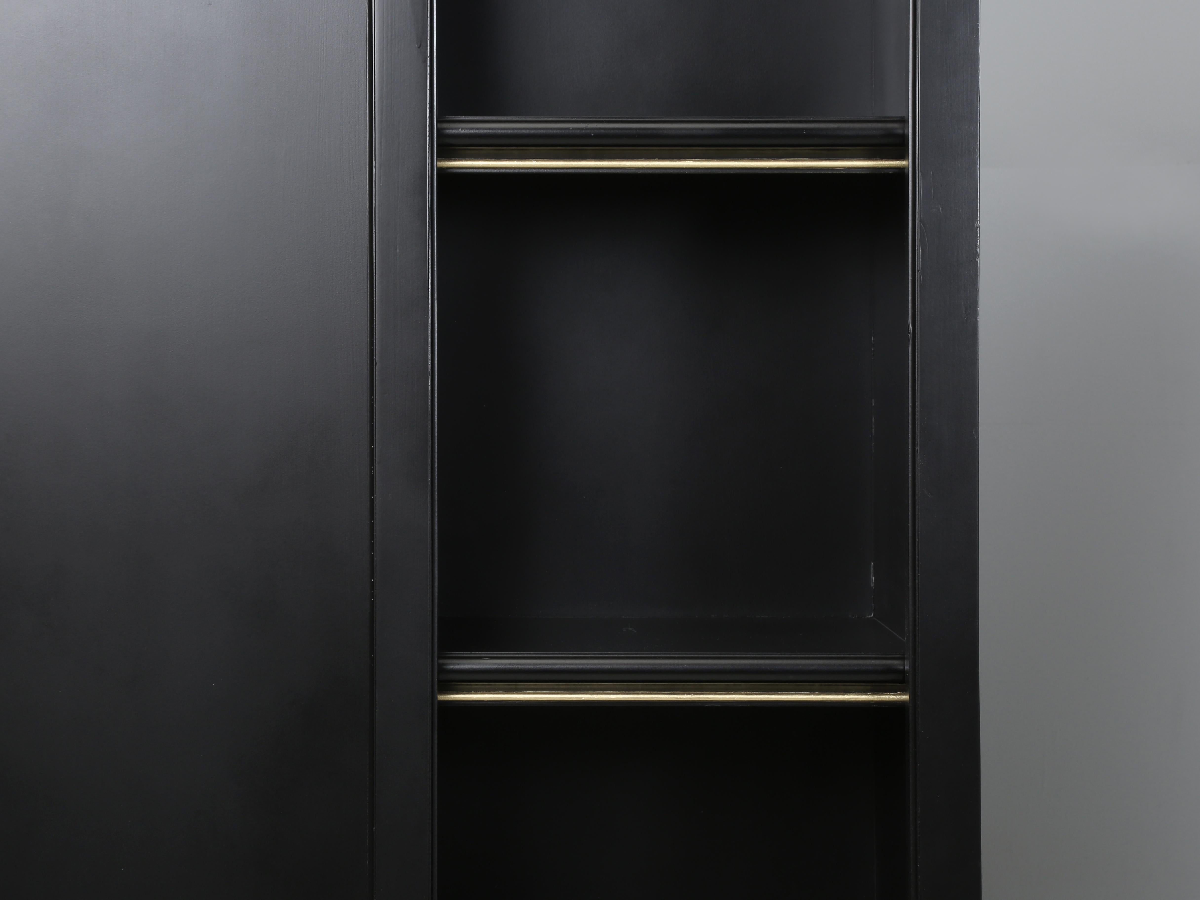Contemporary Bookcase with a Large TV Center Section in Black with Woven Brass Panels For Sale