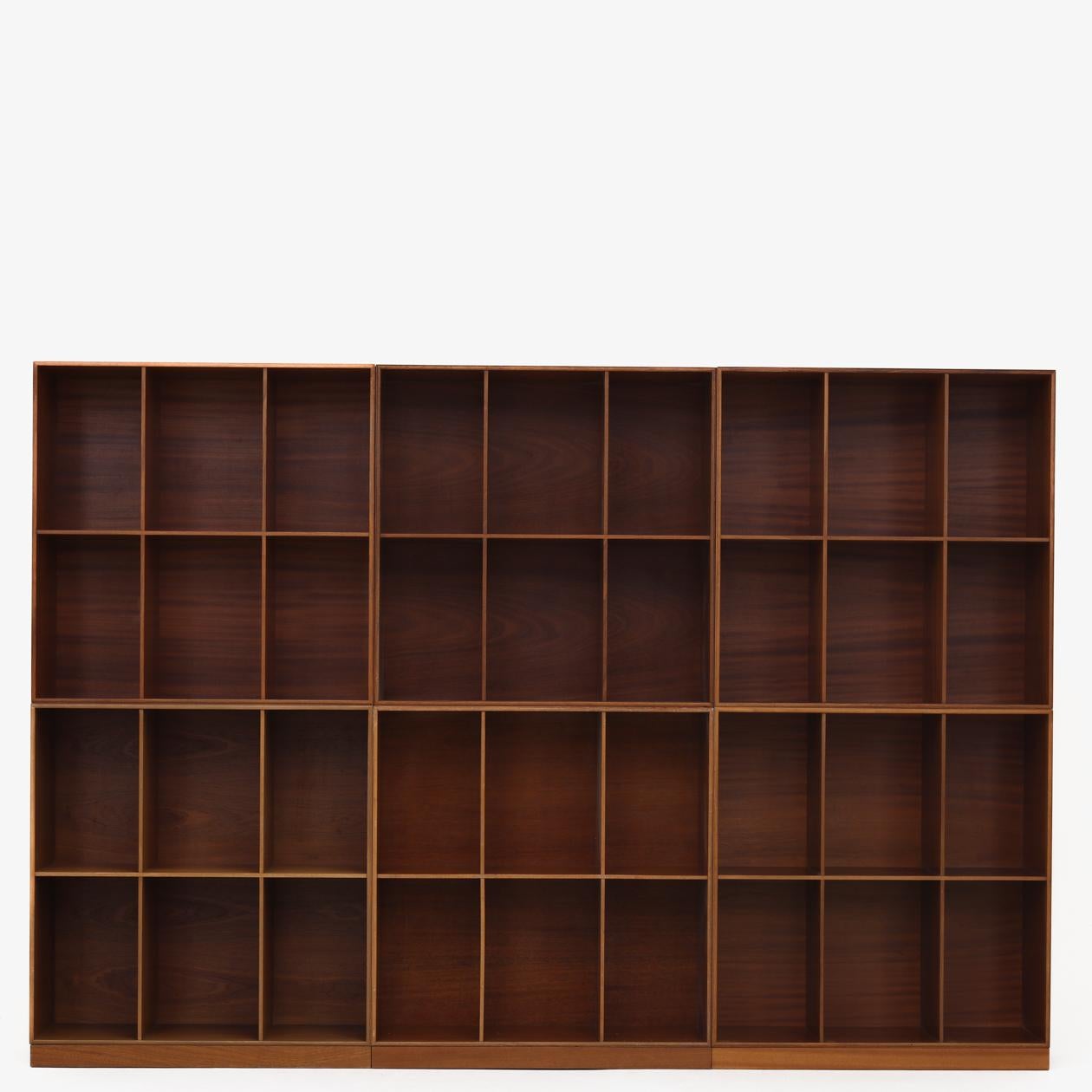 Mahogany bookcases by architect Mogens Koch for master cabinetmaker Rud. Rasmussen. Price is per bookcase, as we offer the bookcases in any number of units and we often have them in mahogany, oak, elm, Oregon pine and more.