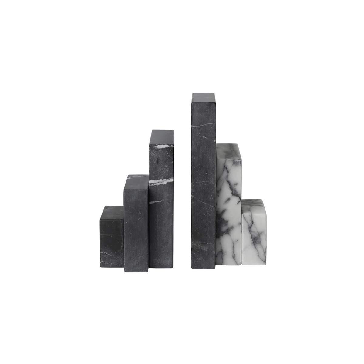 Bookend sculpture by Kristina Dam Studio.
Materials: Tigerskin and Black Marble
Dimensions: 17 x 9 (each) x h 20cm.

The Bookend Sculpture is more than an ordinary bookend. The beautiful marble pieces that form the two bases of this unique bookend