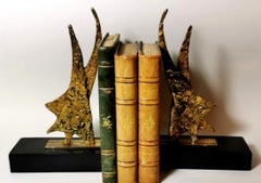 Bookends in Brass and Black Marble in the Shape of a Stylized Star of David 20th