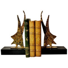 Retro Bookends in Brass and Black Marble in the Shape of a Stylized Star of David 20th