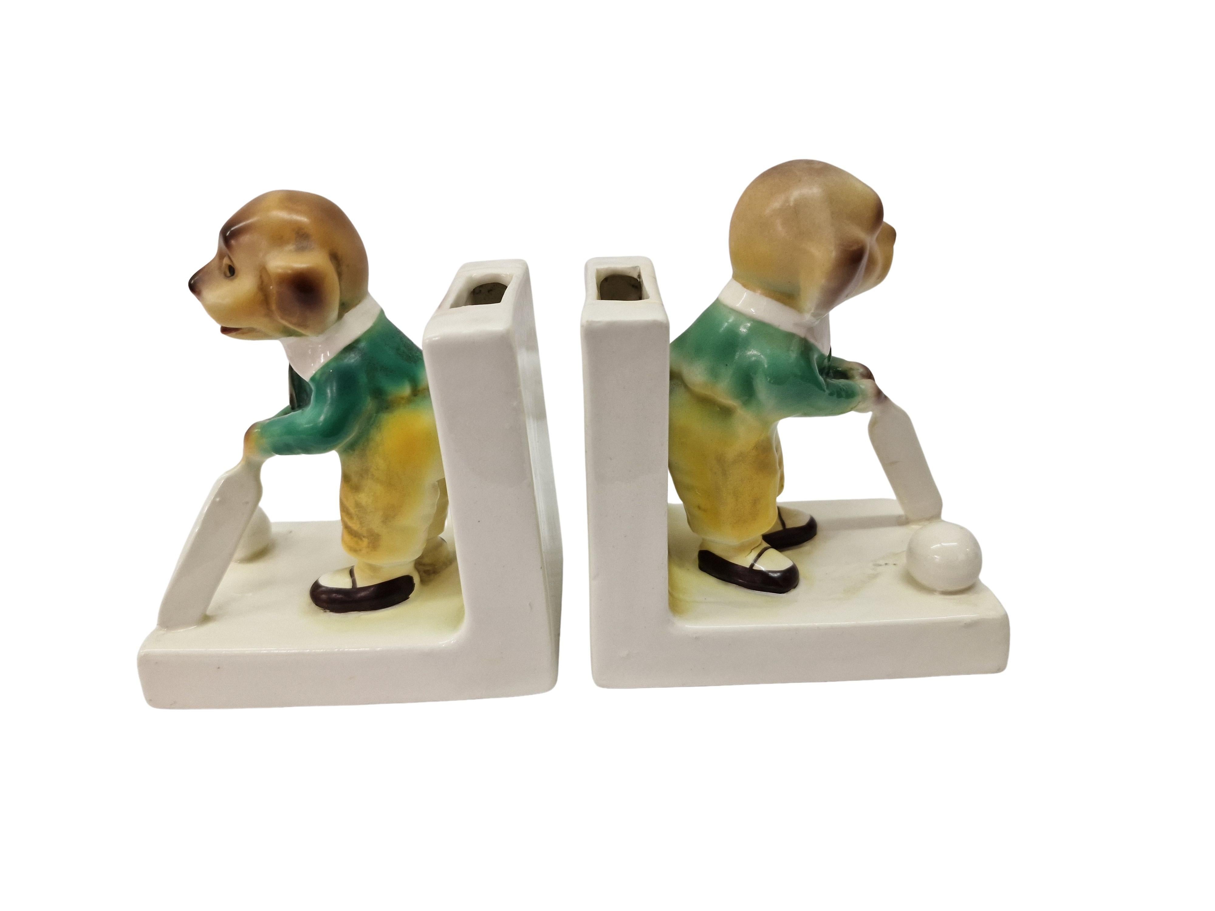 English Bookends pair of cricket-playing dogs, porcelain, Art Deco, before 1923, England
