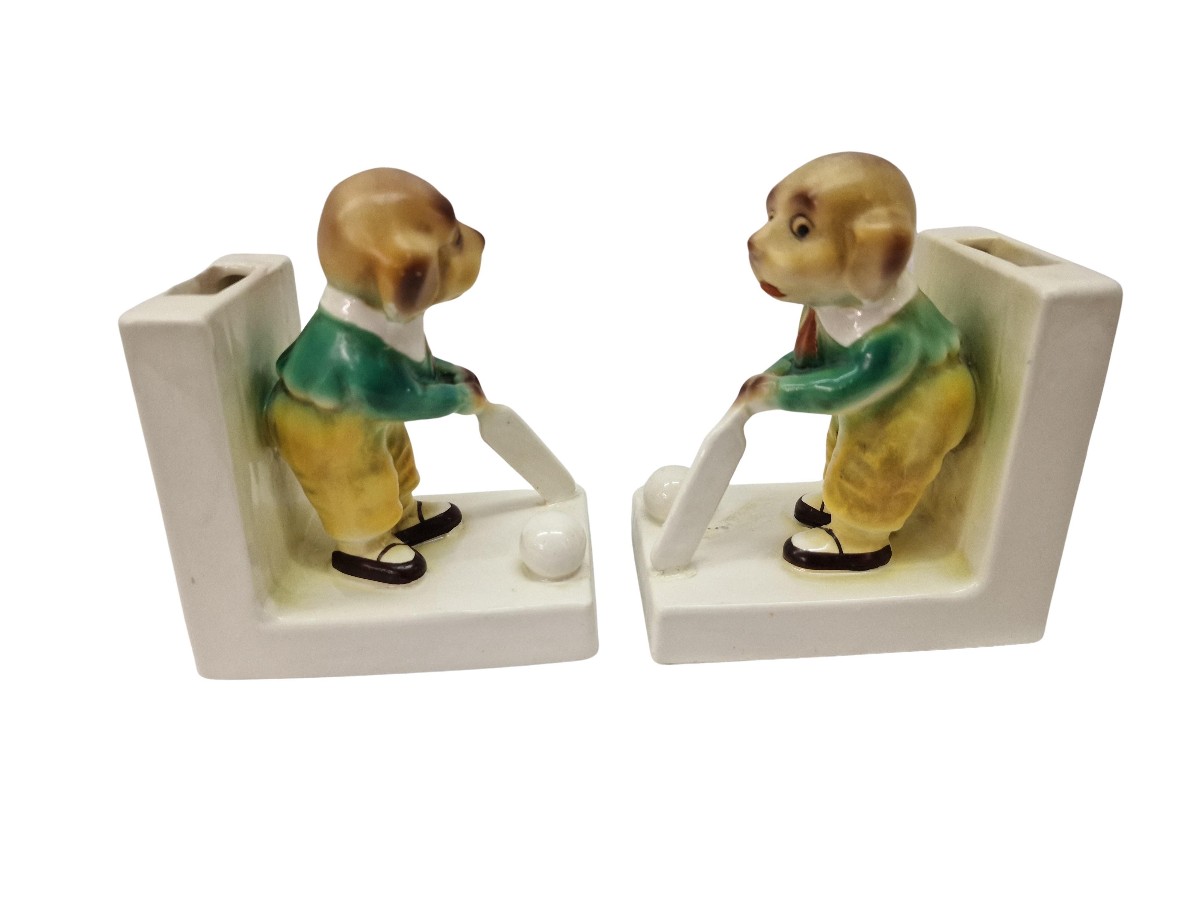 Glazed Bookends pair of cricket-playing dogs, porcelain, Art Deco, before 1923, England