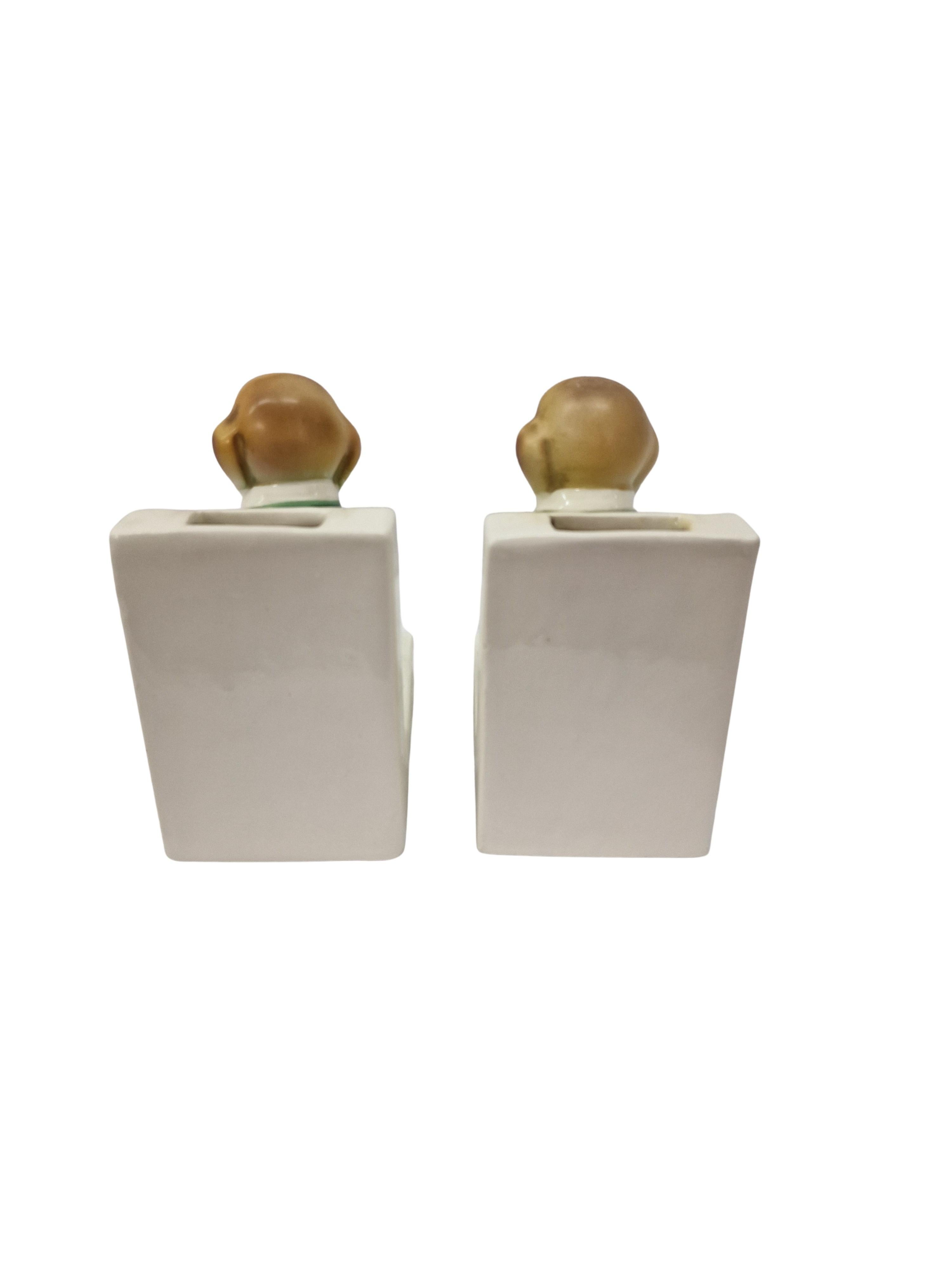 Bookends pair of cricket-playing dogs, porcelain, Art Deco, before 1923, England 1