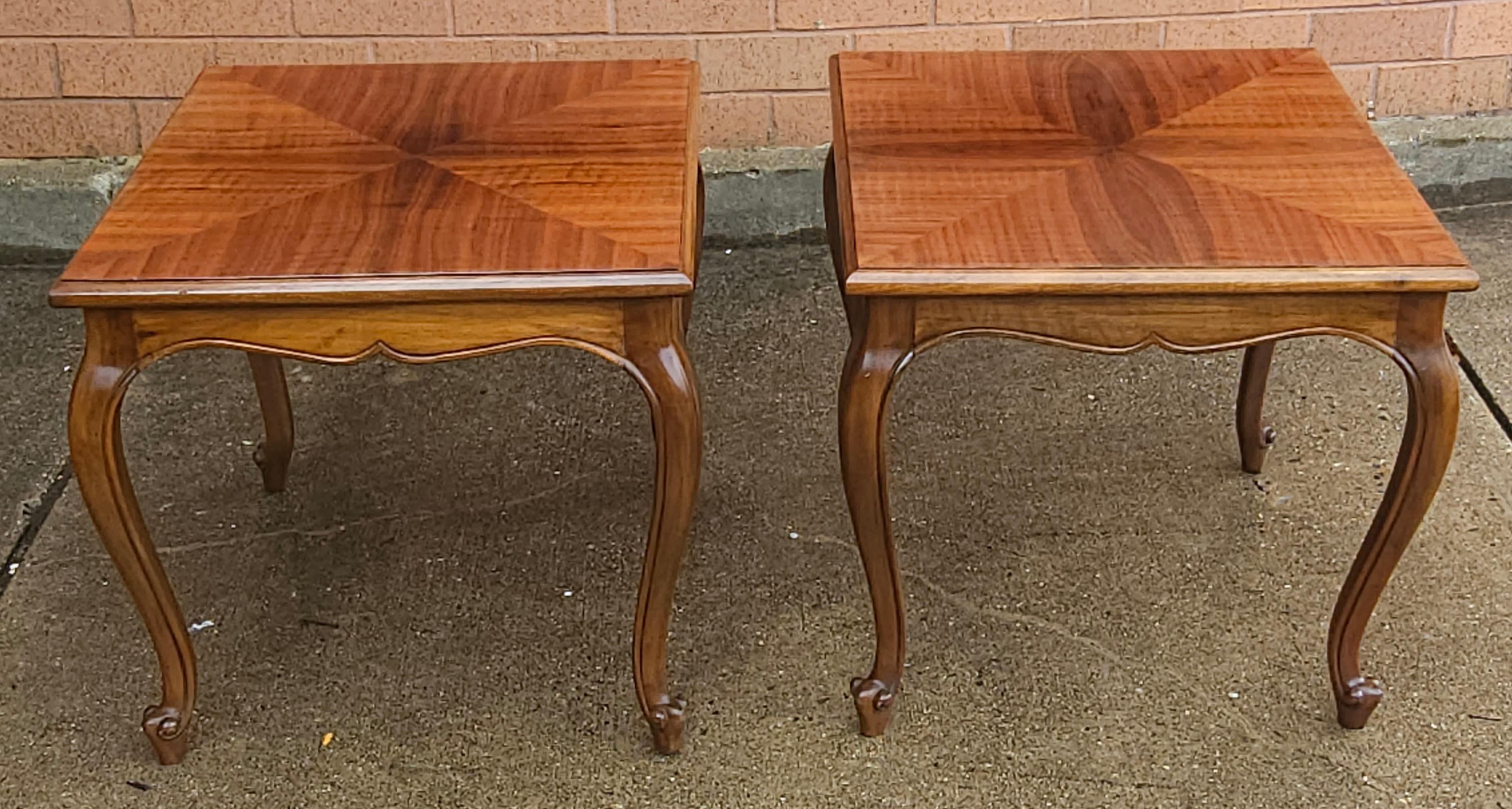 A very fine pair of handcrafted Brazilian Rosewood side tables in the Provincial style. Brazilian Rosewood is one of the rarest, most sought after Rosewoods in the World. Brazilian Rosewood is renowned for its colorfully patterned grain. Brazilian