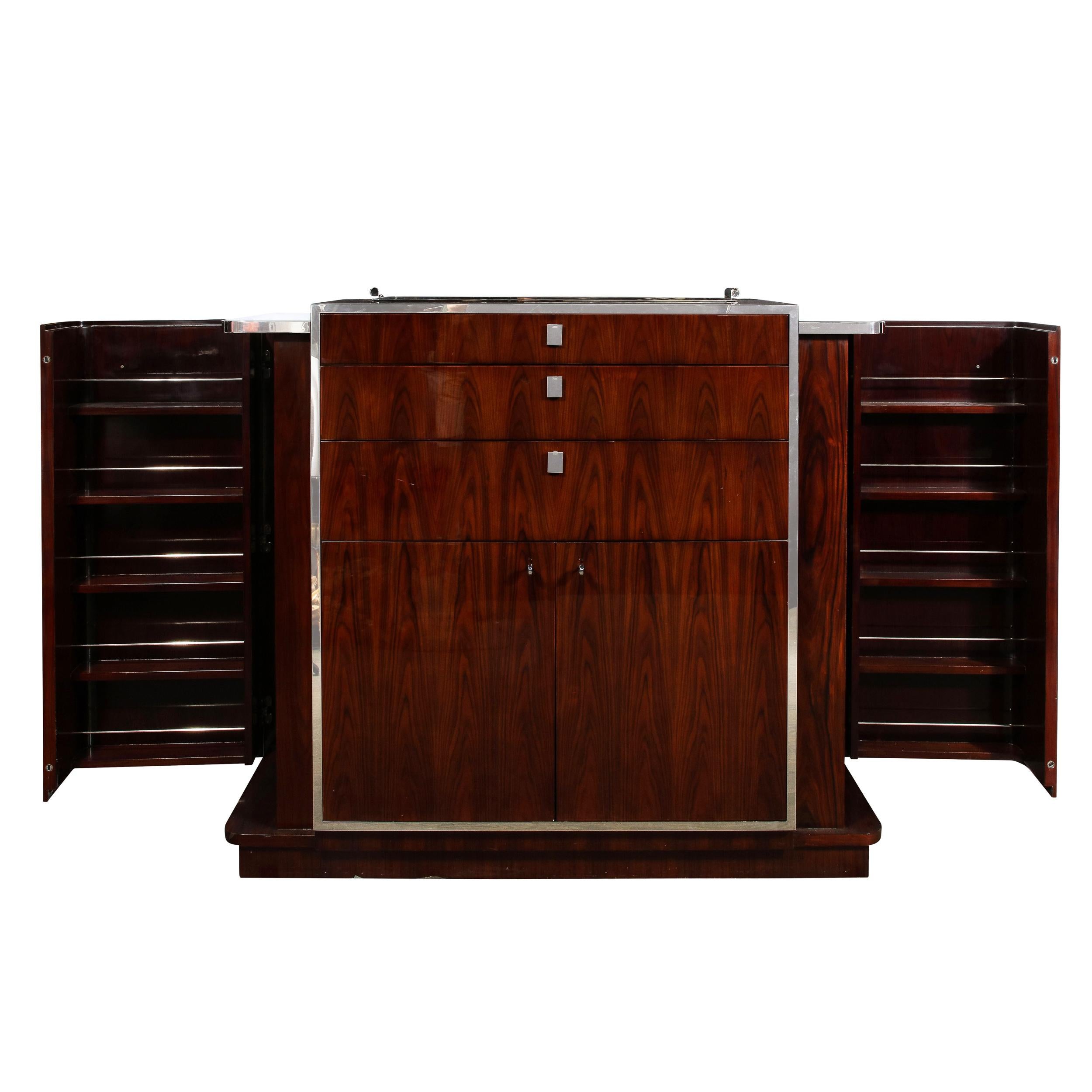 This elegant modernist bar cabinet was realized by Ralph Lauren- the visionary designer of clothing and homeware that, as much as anyone else of the 20th century, defined modern American style. This bar cart- meticulously realized in bookmatched