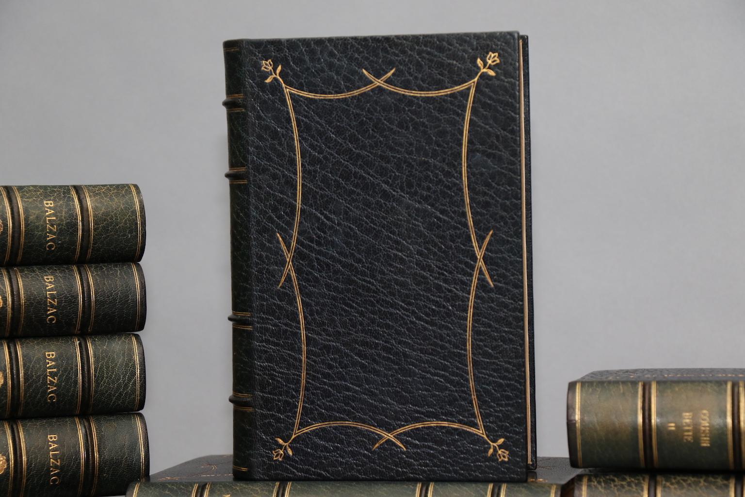 Leatherbound. 53 volumes. Limited to 7 copies, this is #3. Exquisitely bound in full blue morocco, with green morocco gilt doublers, watered silk linings, and all edges gilt. Plates in four states: one on Japanese Vellum, one on India Paper, one on