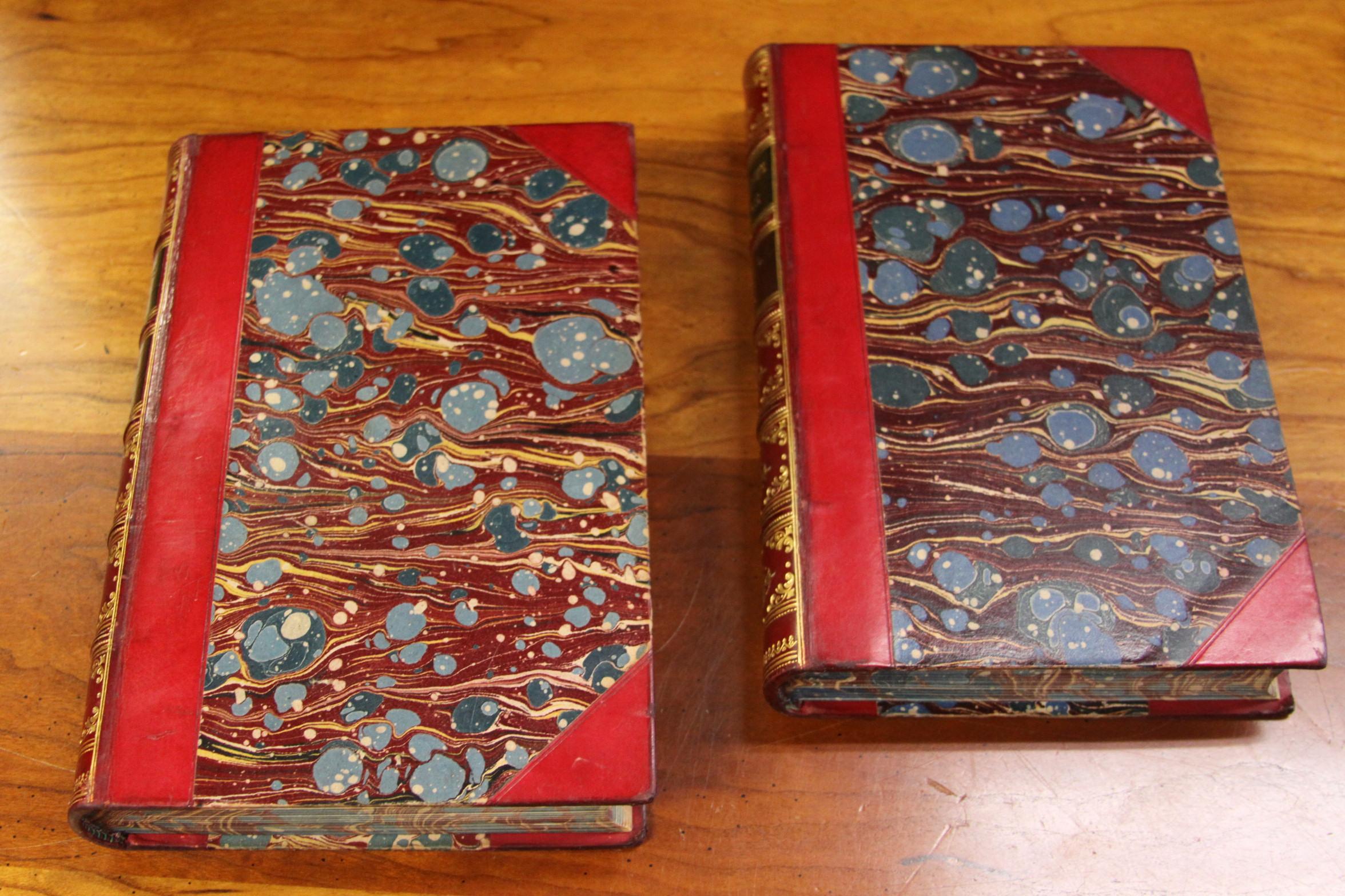 Antique books. Ten volumes. The works of Henry Fielding with essay and life. Published: London by Bickers and Son 1894. Bound in three quarter red calf, marbled boards, floral gilt motif to spine, gilt titles, raised bands, green and maroon titles