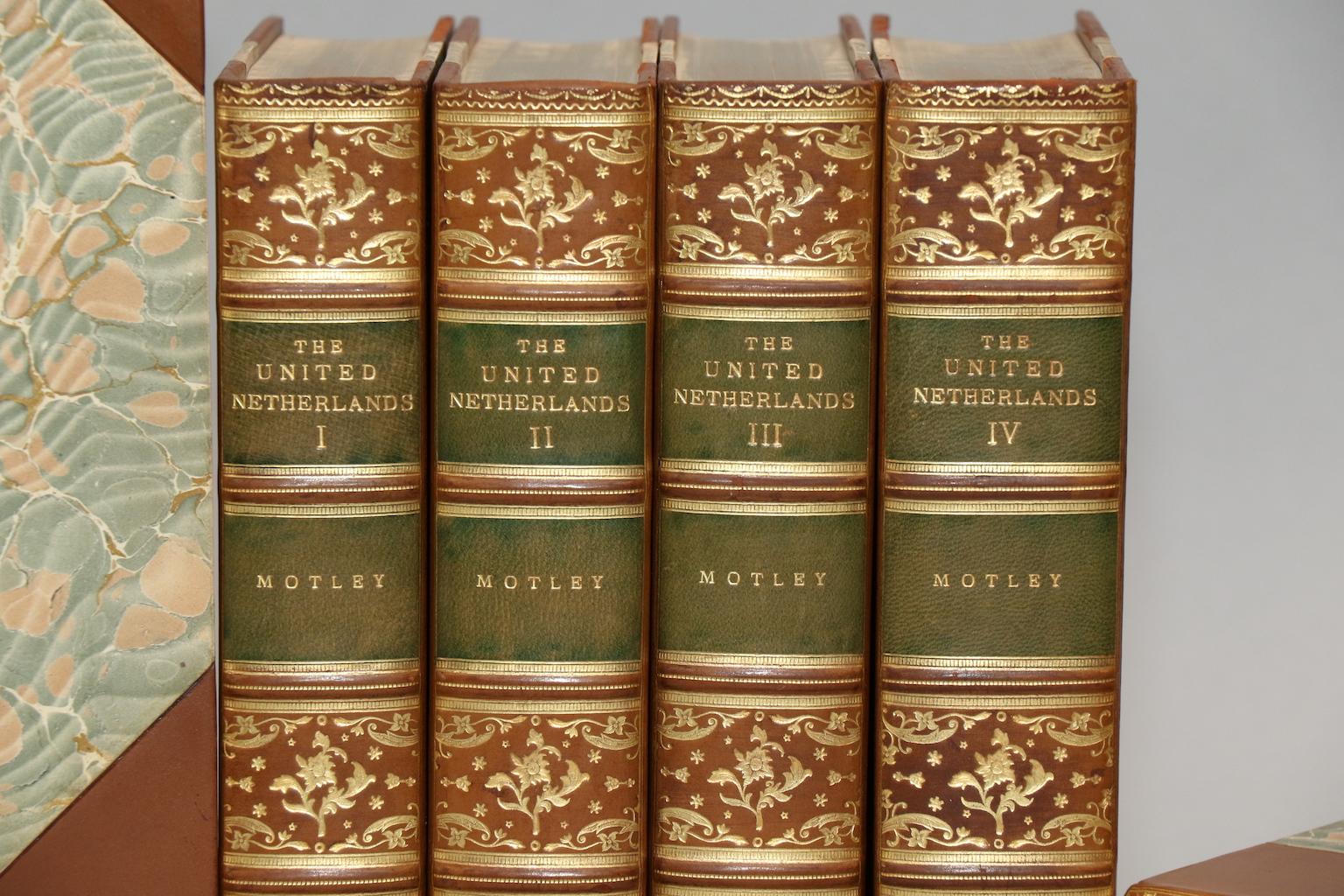 Leatherbound. Nine volumes. Octavo. Bound in three quarter tan calf by Zaehnsdorf Binders, marbled boards, top edges gilt, raised bands, & ornate gilt on spines. Titles include: 