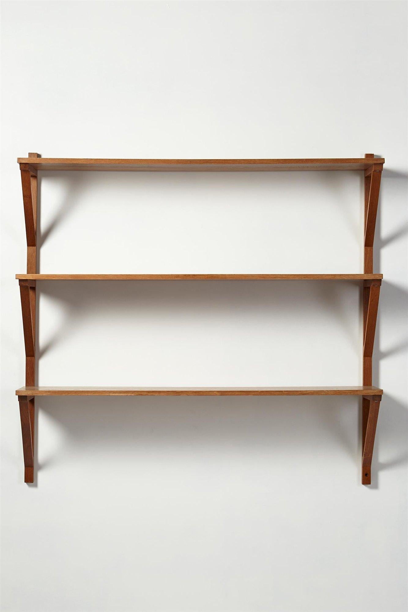 Bookshelf, designed by Børge Mogensen for Erhard Rasmussen, Denmark, 1950s. Solid oak.
 