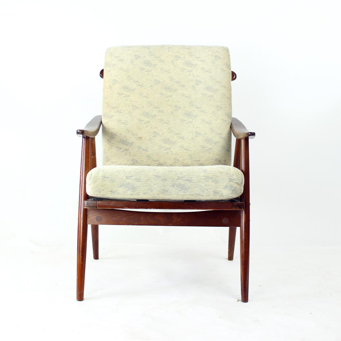 Iconic Boomerang armchair produced by TON company in 1960s in Czechoslovakia. The name comes from the curved armrests. The chairs are produced as elegant and airy design with light, but strong construction. The seat and backrest cushion are in