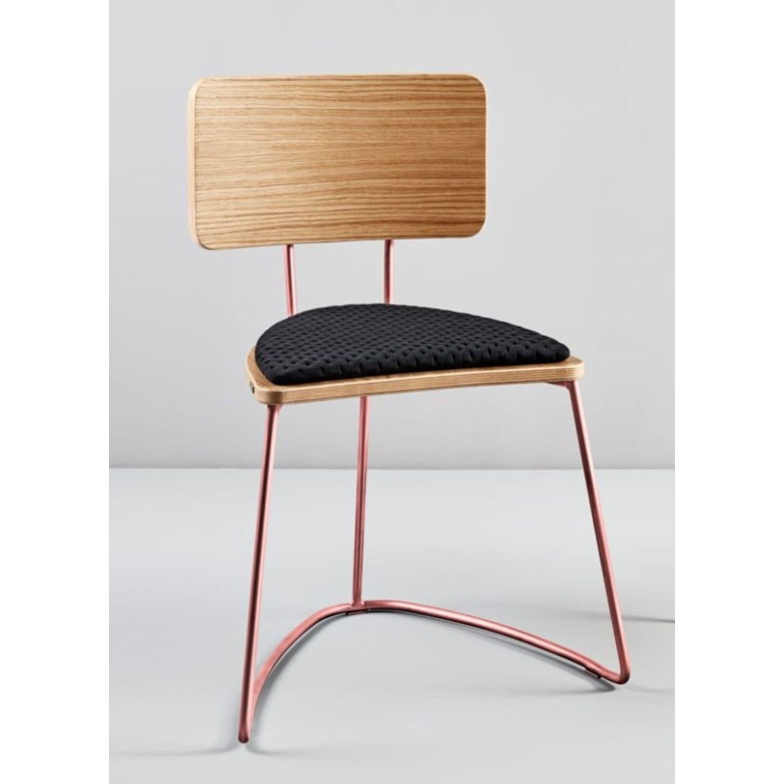Boomerang chair, black by Pepe Albargues
Dimensions: W54, D54, H76, Seat 46.
Materials: Paint coated iron structure / gold / copper or chromed iron structure
Plywood backrest and seat covered with a natural oak wood layer
Upholstered seat
