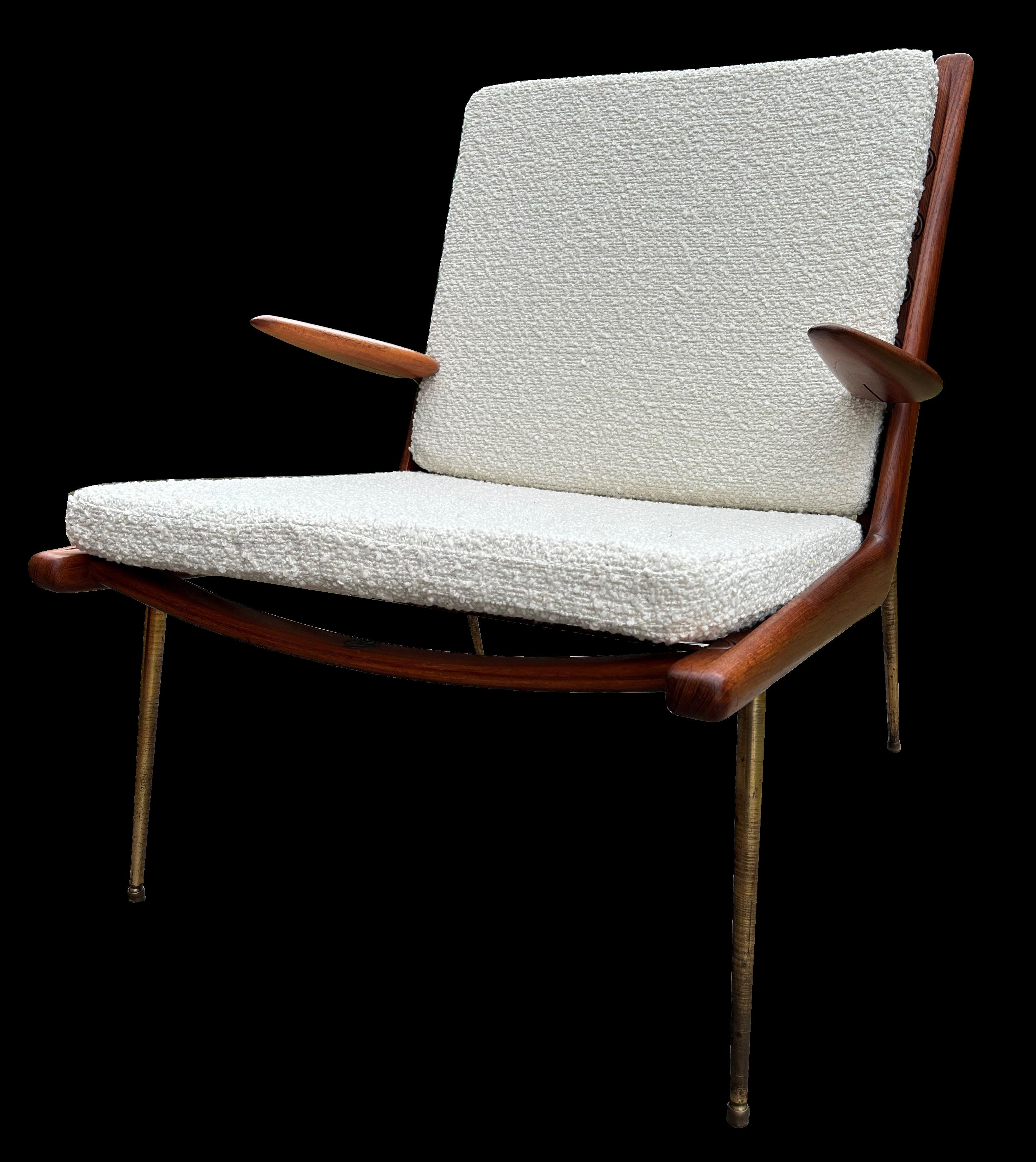 This is is a very nice original armed version of a classic Boomerang chair by Peter Hvidt and Orla Molgaard Nielsen for France & Son, now freshly upholstered in white boucle fabric