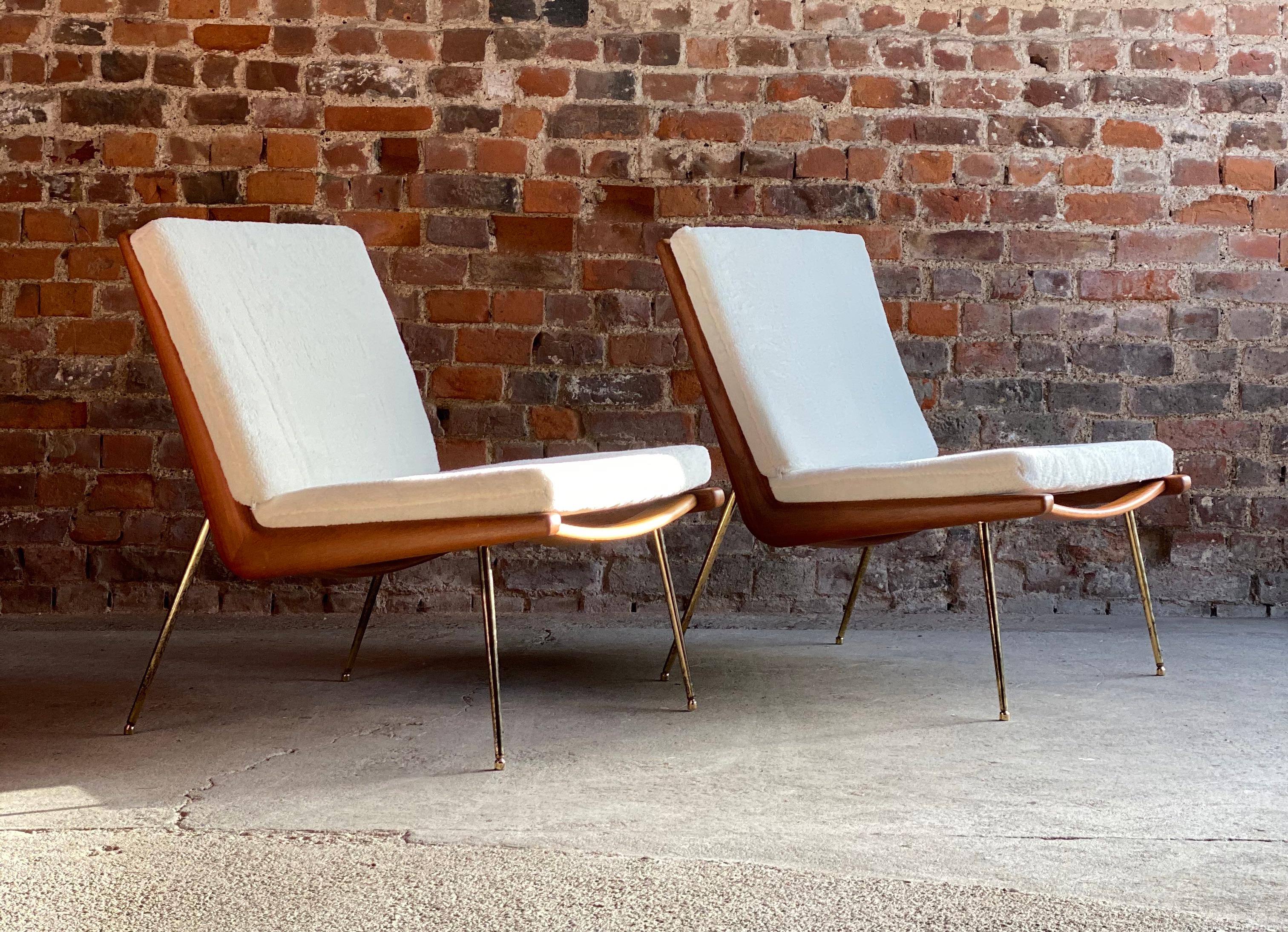 Boomerang chairs France & Son Pair of Peter Hvidt & Orla Mølgaard Nielsen, 1950s

A pair of Boomerang chairs by Peter Hvidt and Orla Mølgaard Nielsen manufactured by France & Son, Denmark, the teak frames sit on brass-plated legs with sabots, The