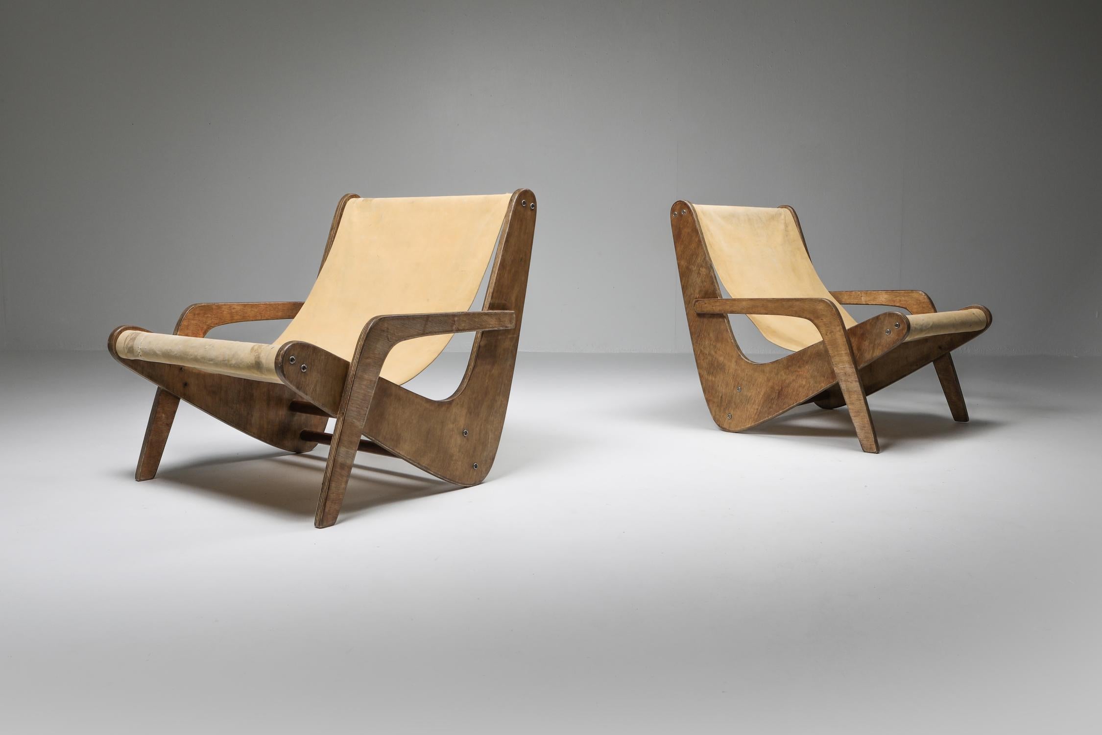 Jose Zanine Caldas, boomerang lounge chairs, Mòveis Artisticos Z, Brasil, circa 1950s

Important chairs in original condition.
Personally I believe it to be the utmost importance of keeping these museum quality pieces as they are; 'dans son