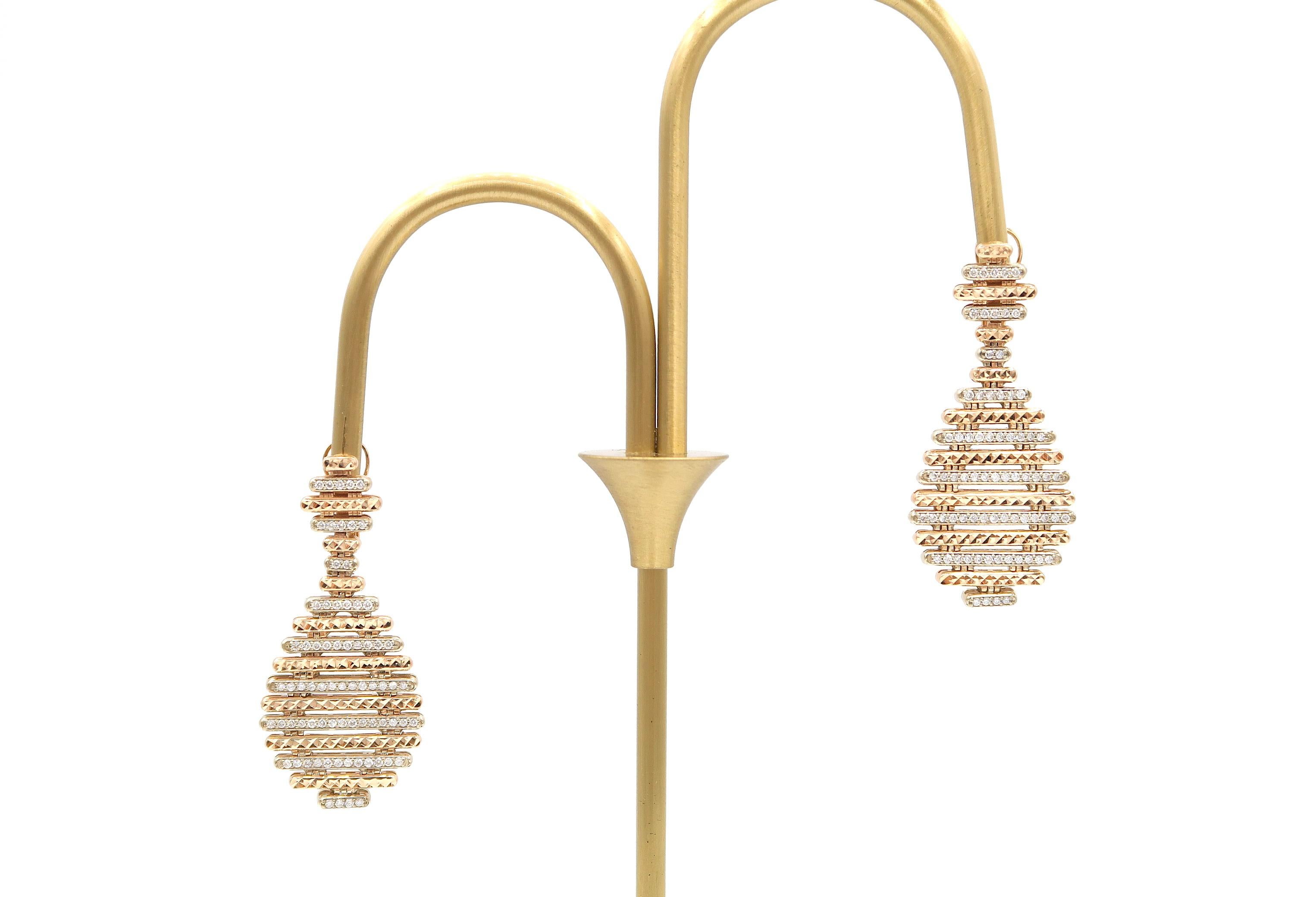 BOON Multiple Horizontal Rods Diamond Pavé Chandelier Earrings in 18 Karat Rose Gold and White Gold

Gold: 18K 16.88g.
Diamond: 0.98ct.