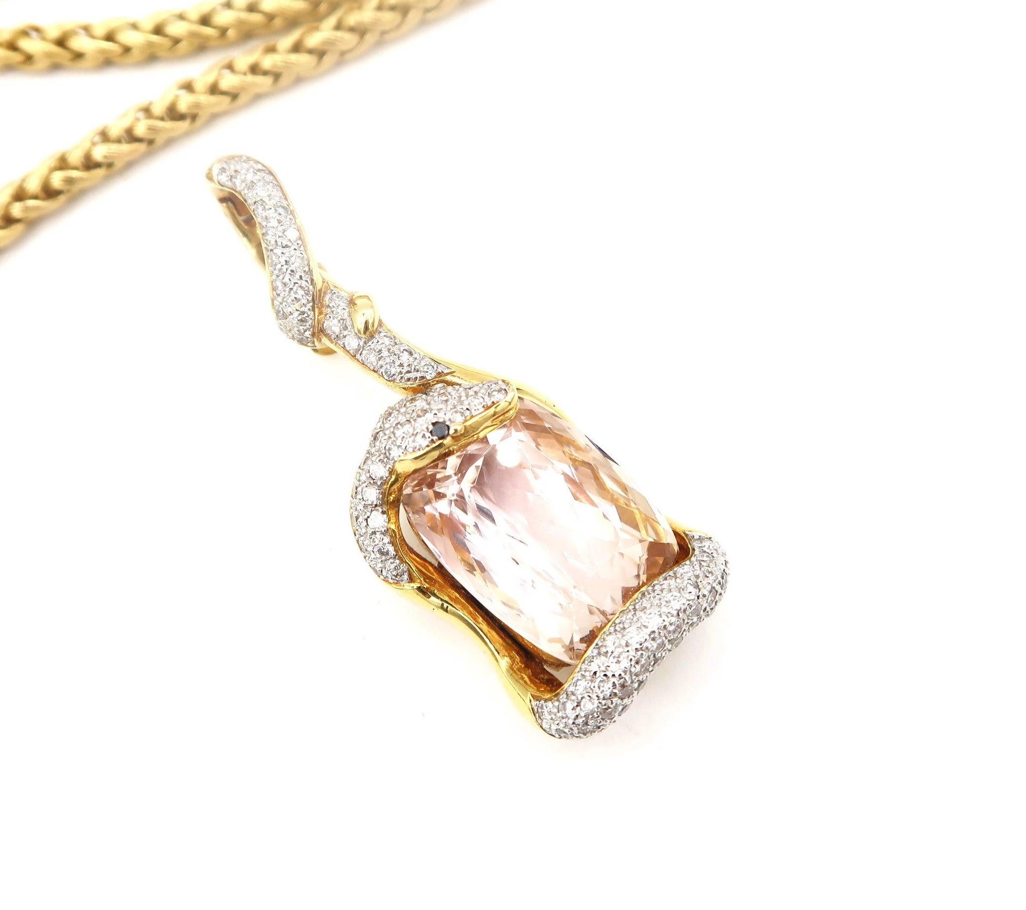 Serpentine 34.92 Carat Oval Kunzite and Diamond Pendant
Kunzite: 34.92 ct
Diamond: 1.80 ct
Black Diamond: 0.02 ct
Gold: 18K, 26.43g
Dimensions: 6cm x 2cm

Silk-Finished 18 Karat Gold Chain
Length: 35.75 inches
Gold: 18K, 65.469 g