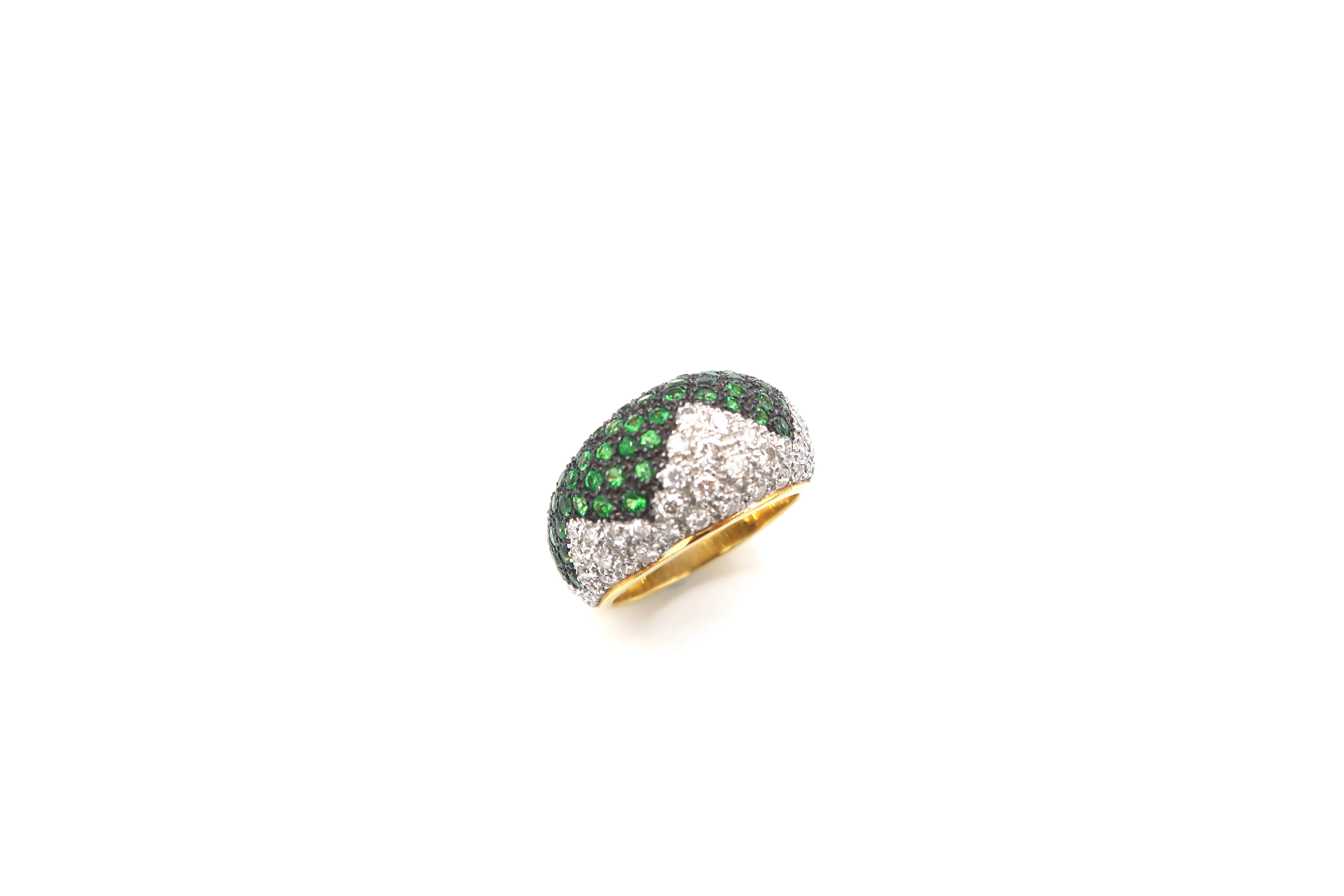 Convex Zigzag-Lined Tsavorite and Diamond Pavé Ring in 18K Gold

Complimentary Resizing Service

Ring Size: UK M, 53, US 6 1/2

Diamond: 0.70ct.
Tsavorite: 1.11ct.
Gold: 18K Gold 18.959g.