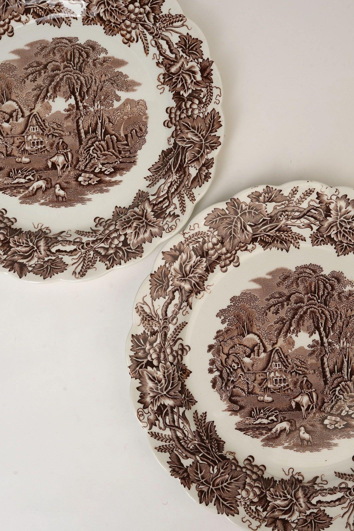 This set of two vintage brown transferware plates from Booths England, part of the classic 