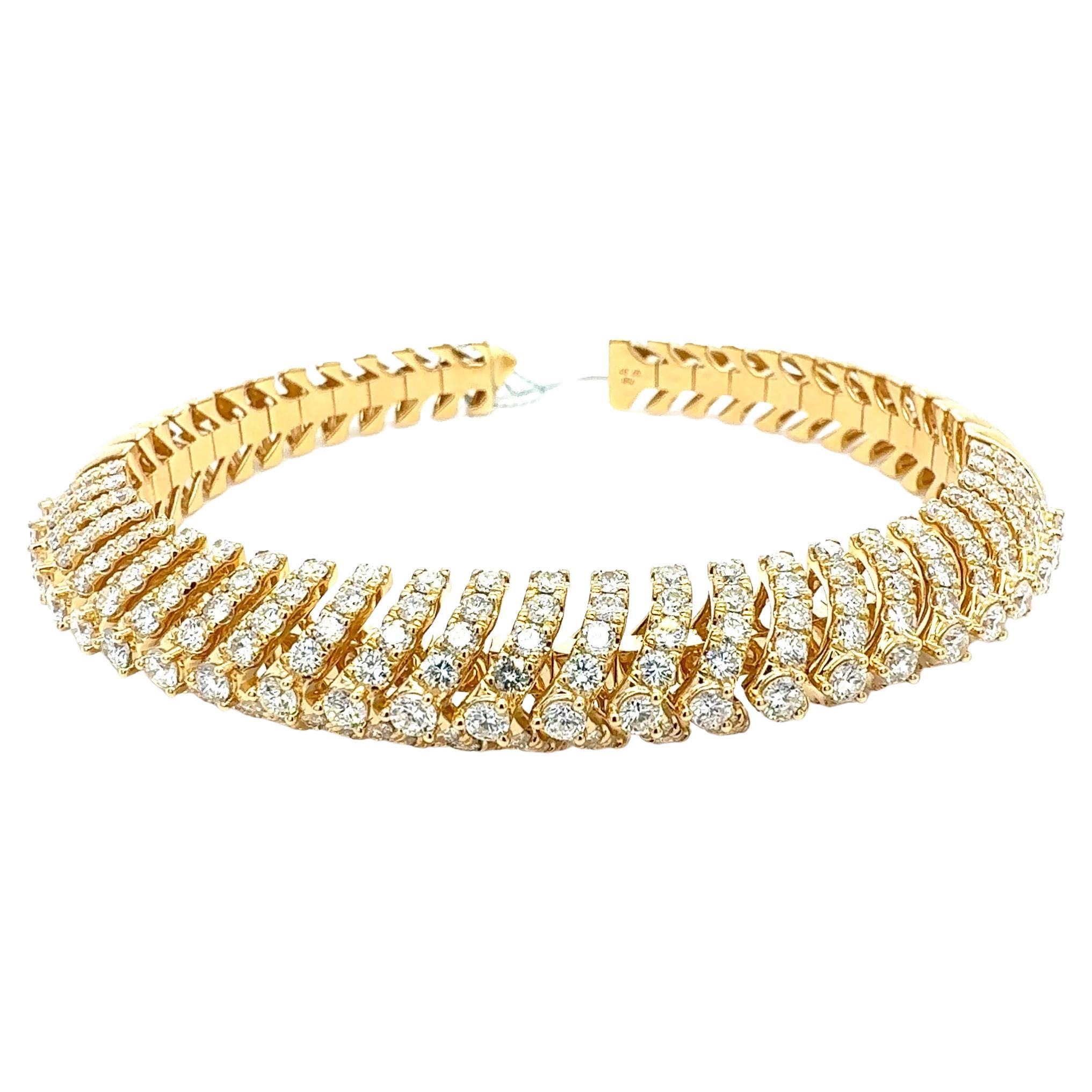 Bora
Co. Bangle flessibile in oro giallo 18 carati e diamanti naturali
