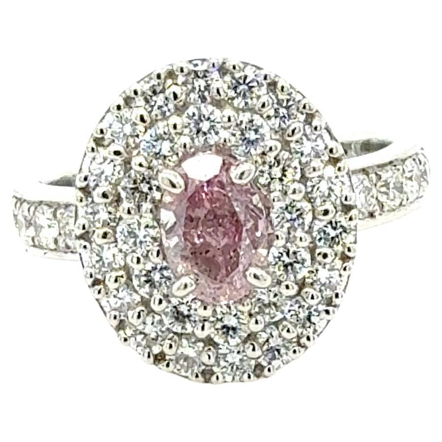 Bora
Co GIA Certified 0.71ct Fancy Intense Purplish Pink
Diamond Ring