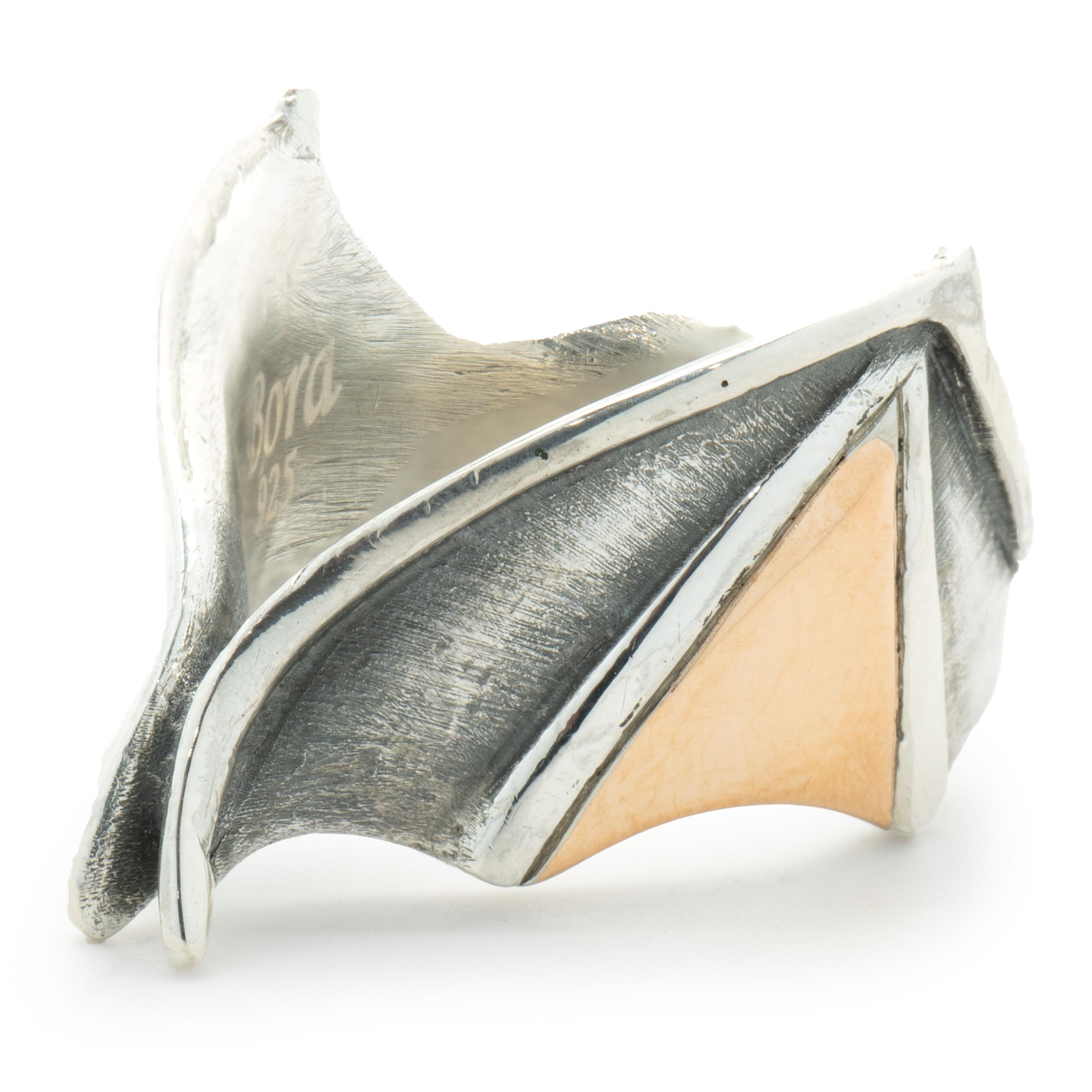 Designer: Bora
Material: sterling silver 
Dimensions: ring top measures 15mm wide
Size: 7.5
Weight: 9.90 grams
