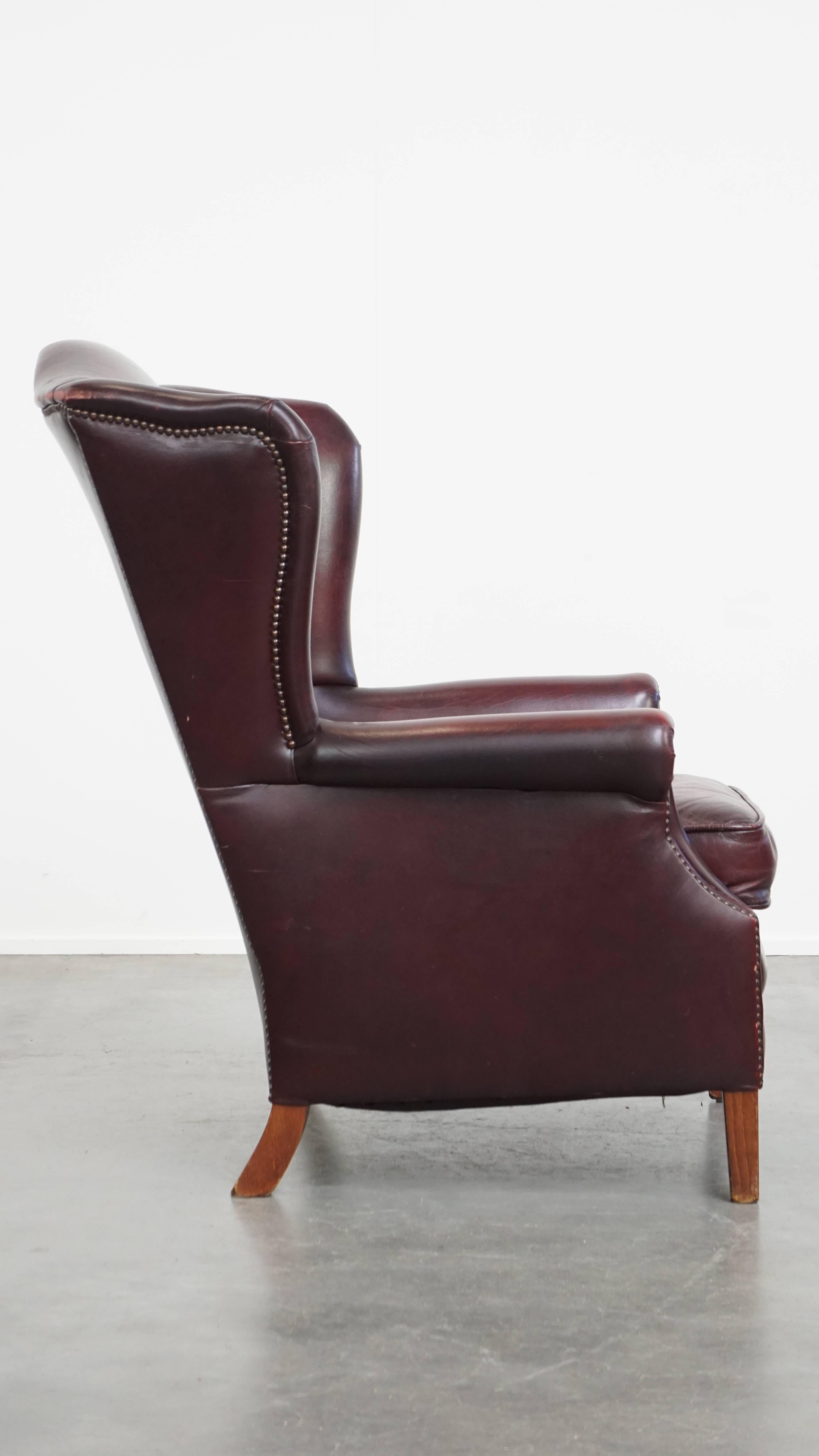 Classical Roman Bordeaux Red Cowhide Wingback Armchair + Ottoman in English Style For Sale