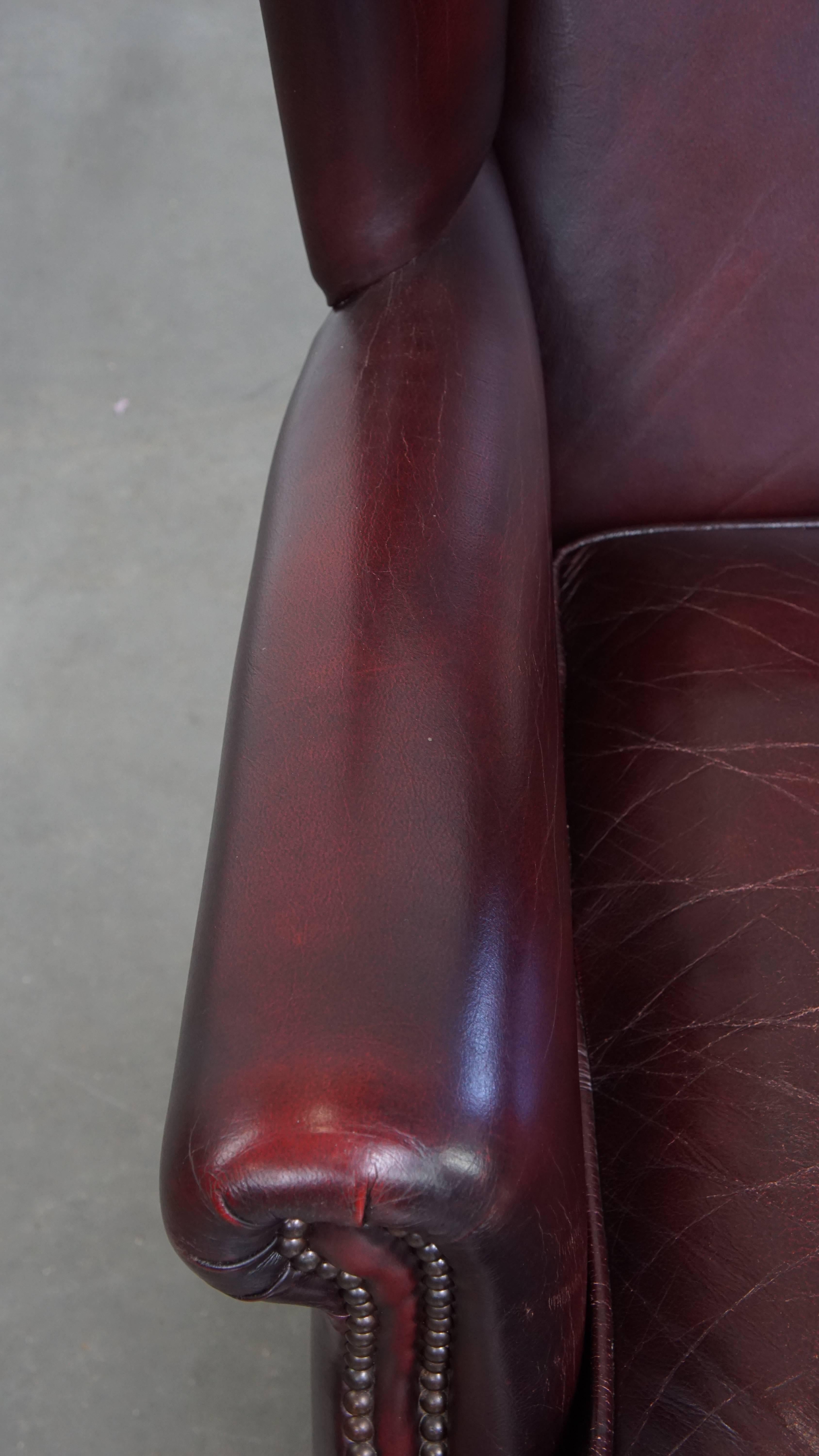Bordeaux Red Cowhide Wingback Armchair + Ottoman in English Style For Sale 1