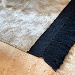 Border and Tassel Rug