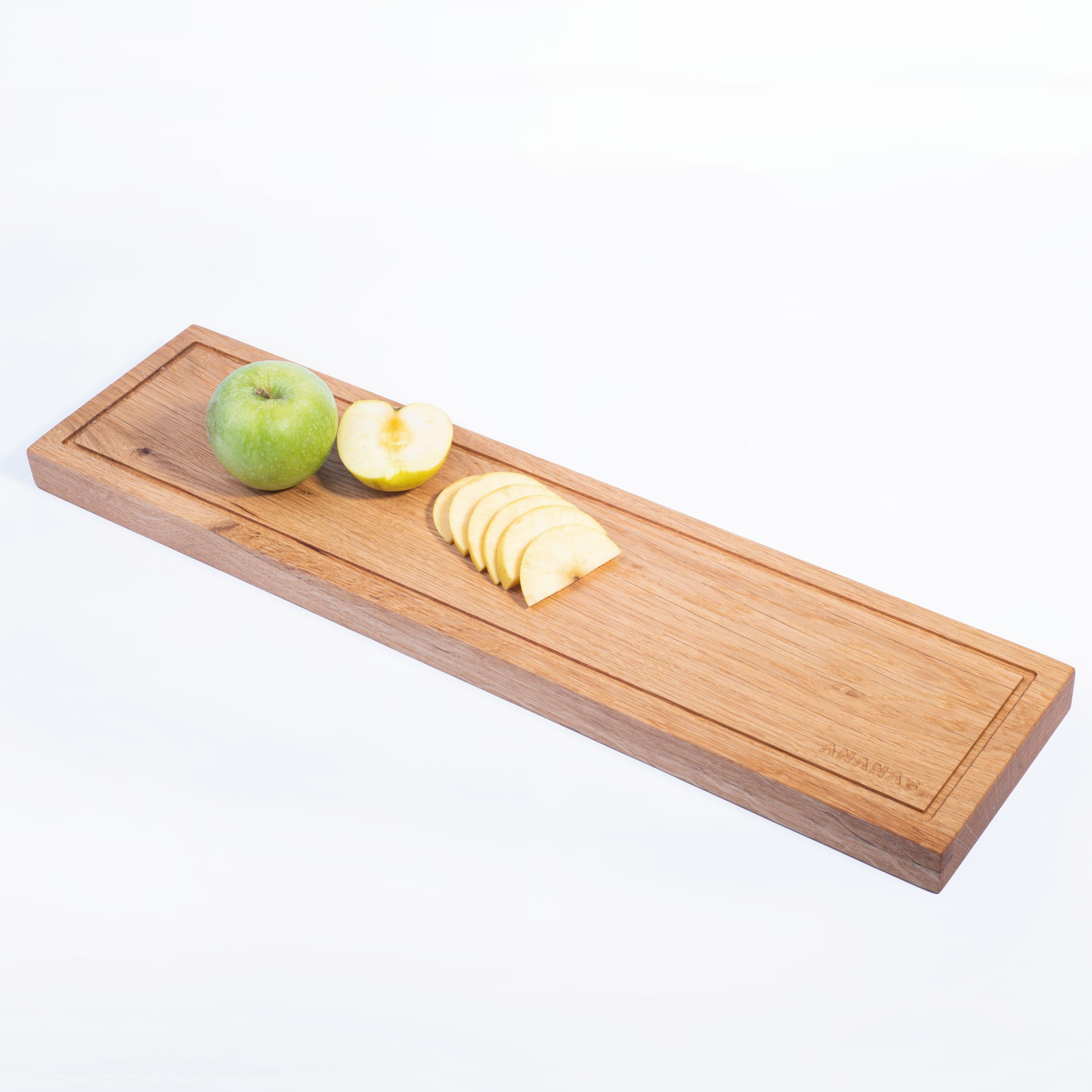 Suitable for the use of two people, serving board. It is produced from the solid oak tree. It collects the juices of food on the canals of its edges. Each tree is different in pattern, texture, color tone, and vascular structure. This difference