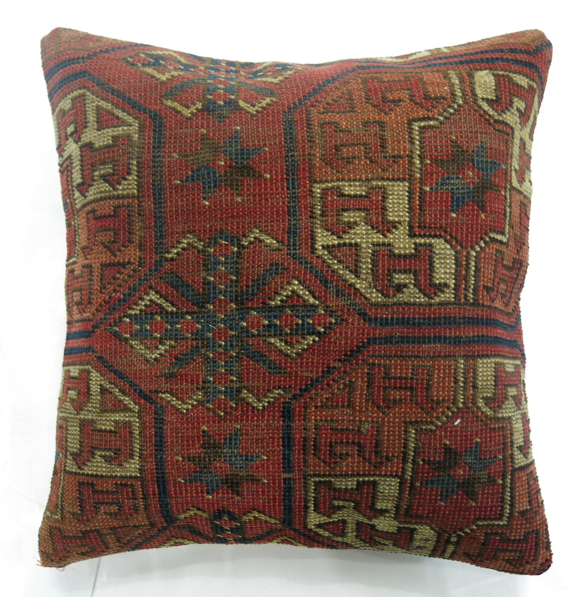 Pillow made from a 19th-century afghan Turkeman rug.

16'' x 16''.