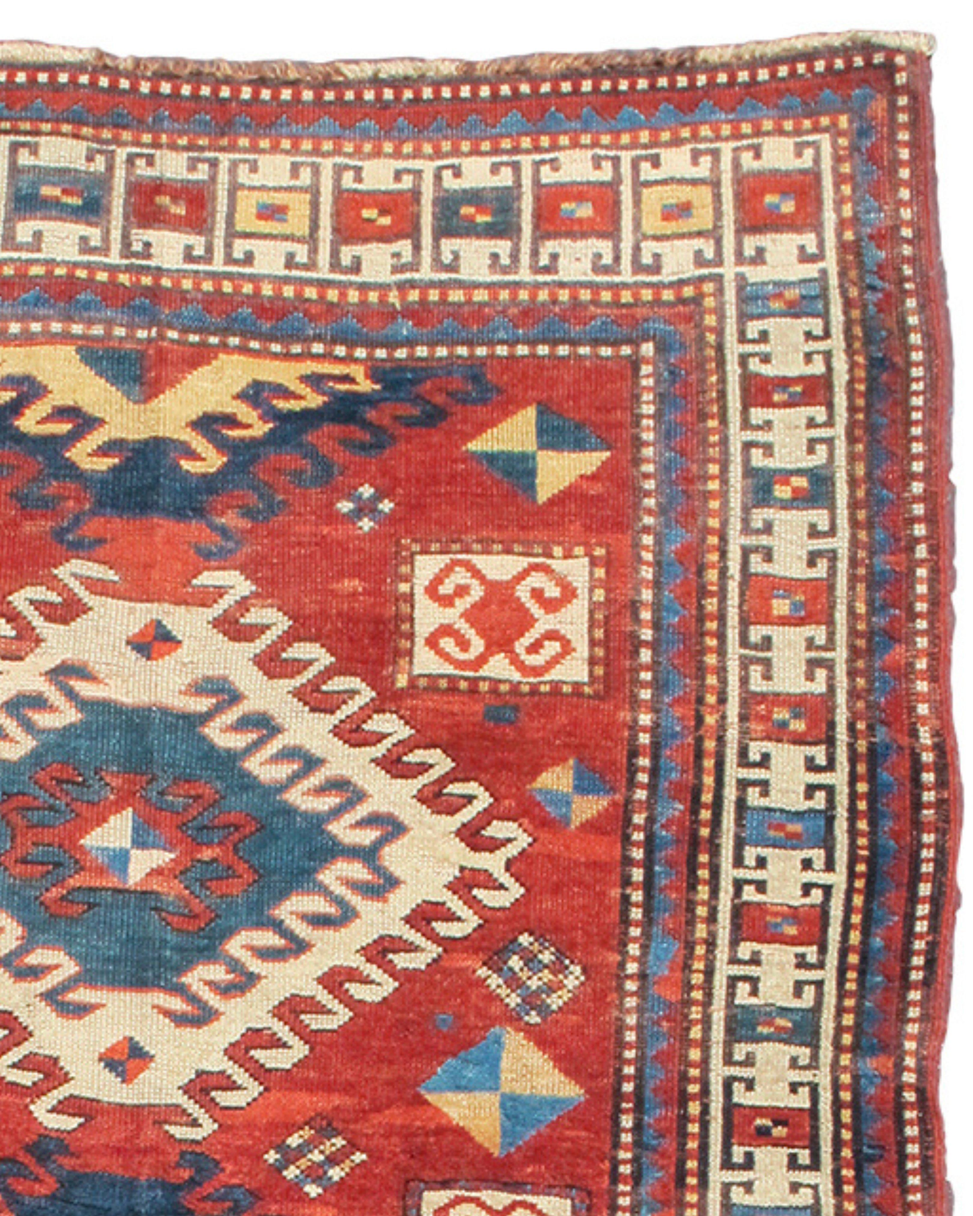 Bordjalu Kazak Rug, Late 19th Century

Woven in remote villages of the Caucus Mountains, Kazak rugs are renowned for their bold graphic design and purity of color. This Bordjalu Kazak variant draws three alternating latch-hook diamonds against a