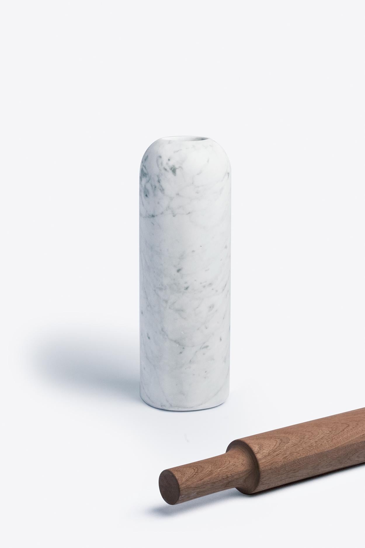 Function meets art in this ordinary kitchen utensil that is transformed in a sculptural object.
Evoking the silhouette of a classic glass bottle, this piece features an elegant combination of materials: the slender wooden body of the rolling pin