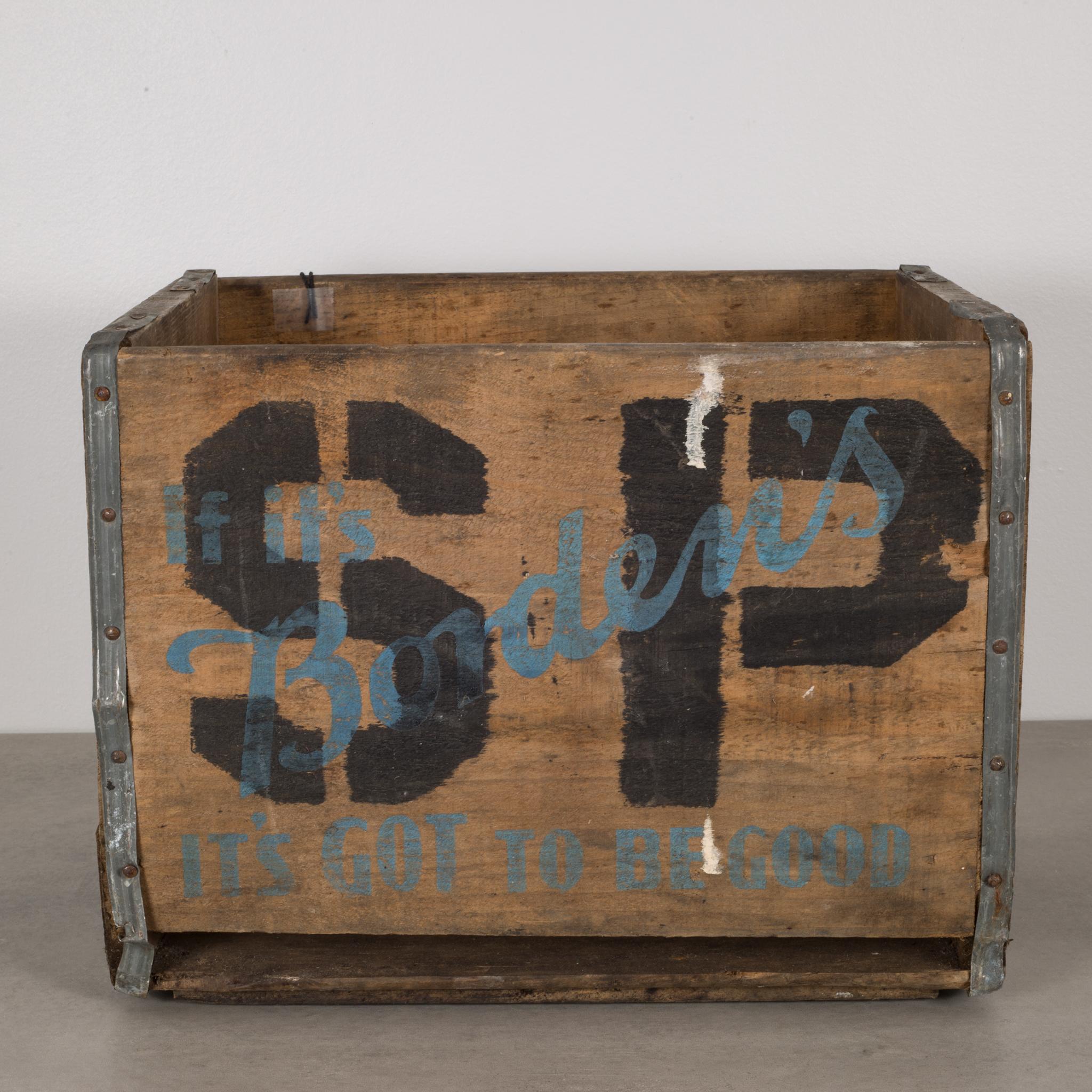 About

This is an original Bordon Dairy milk crate. The wooden crate has reinforcing metal straps on each corner and cutout handles. This is a smaller version of a traditional milk crate. 