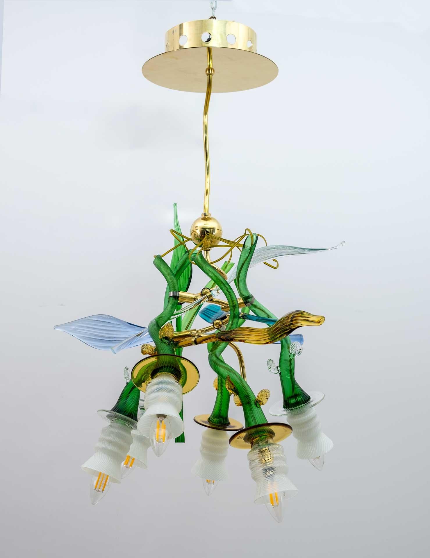 Bohemian Czech Dutch crystal chandelier by designer, architect and artist Borek Sipek (1949-2016). The lamp is published by Driade.
The lamp is a suspension model Luigi I° 1989 ca
brass structure, curved movement arms in green crystal, 5 conical