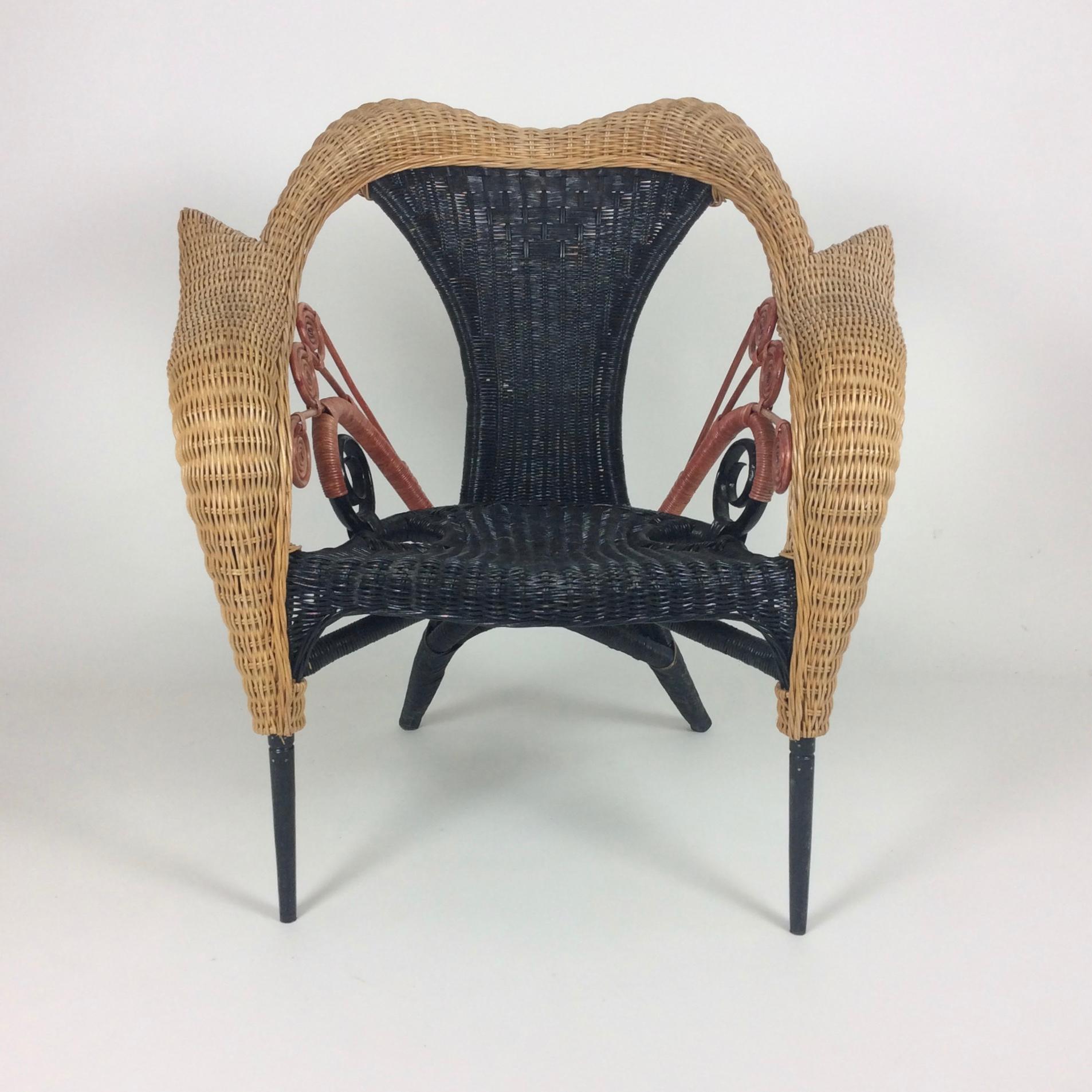 Borek Sipek armchair, Prorok model for Driade, 1988, Italy.
Natural, black and rose-red cane, solid blackened wood.
Dimensions: 90 cm W, 91 cm H, 62 cm D, seat height 45 cm.
Original condition.
All purchases are covered by our Buyer Protection