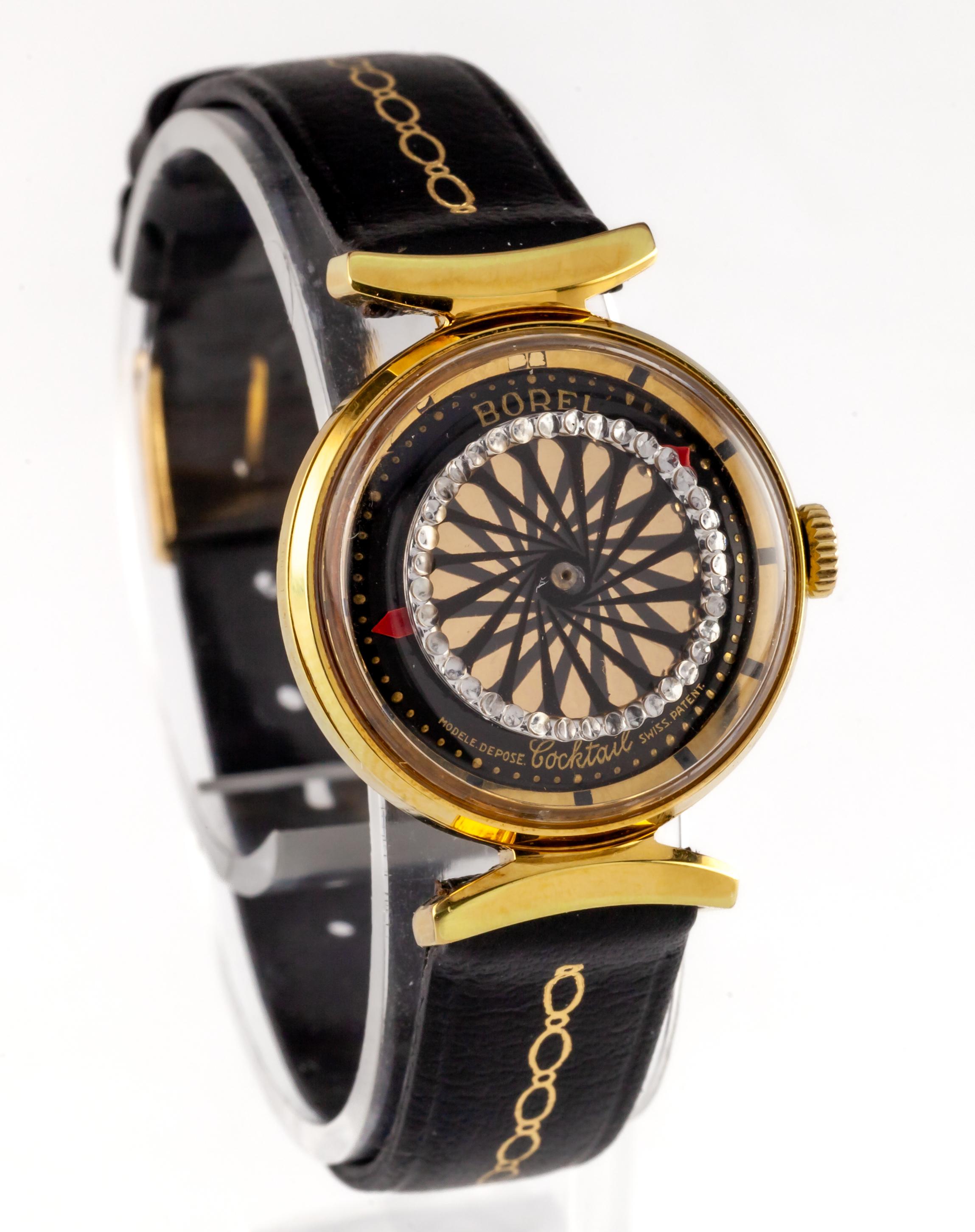 Borel Women's Gold-Plated Hand-Winding Kaleidoscope Watch w/ Crystals New Band
Movement #Borel 26
Model: Cocktail
Gold-Plated Round Watch Case w/ Exhibition Back
24 mm in Diameter (26 mm w/ Crown)
Lug-to-Lug Distance = 32 mm
Lug-to-Lug Width = 17