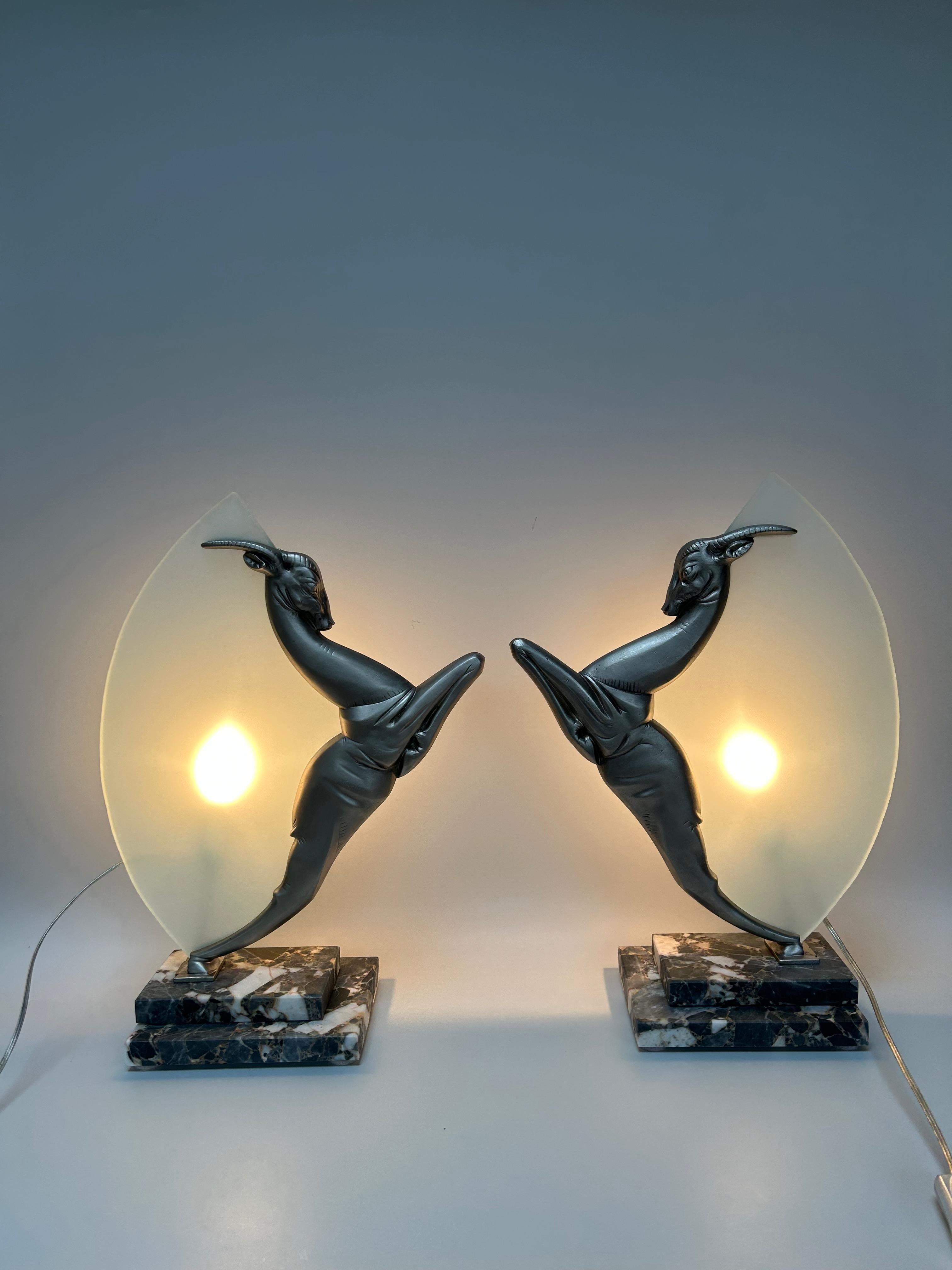 Pair of art deco lamps circa 1930.
Gazelle in silvered bronze on marble base.
Electrified for US, E14 socket, screw bulb.
In perfect condition.
Height: 44.5cm
Width: 31cm
Length: 17.3cm
Depth: 14.3cm
Total weight: 10 kg

Georges-Marius Boretti is a