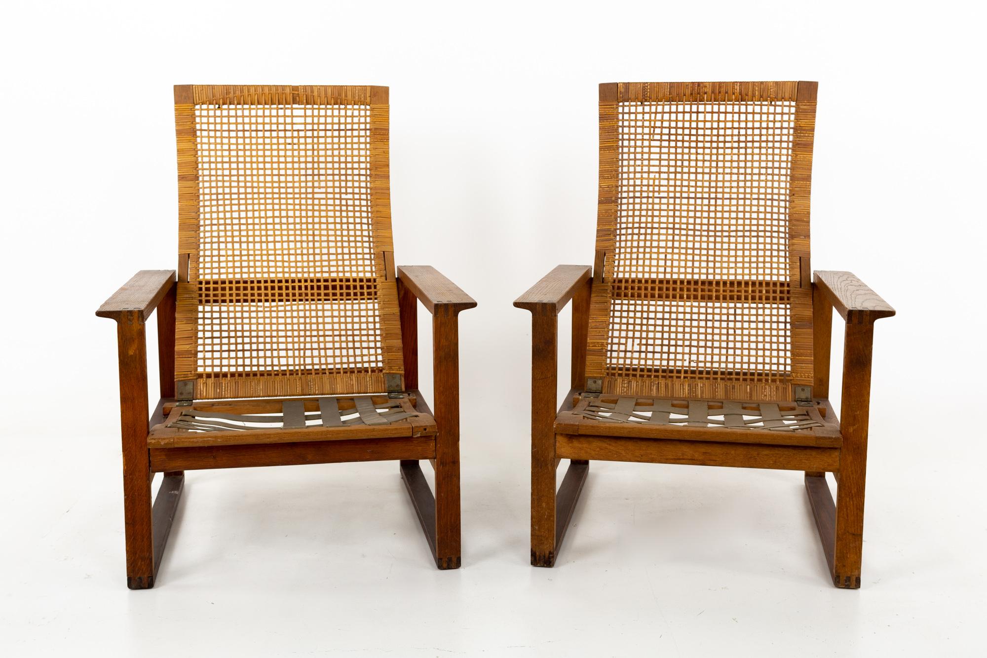 Borge Mogensen 2254 Mid Century oak and cane highbacked lounge chairs - pair.
These chairs are 26 wide x 30 deep x 36 inches high, with a seat height of 11 and arm height of 19.5 inches

This piece is available in what we call restored vintage