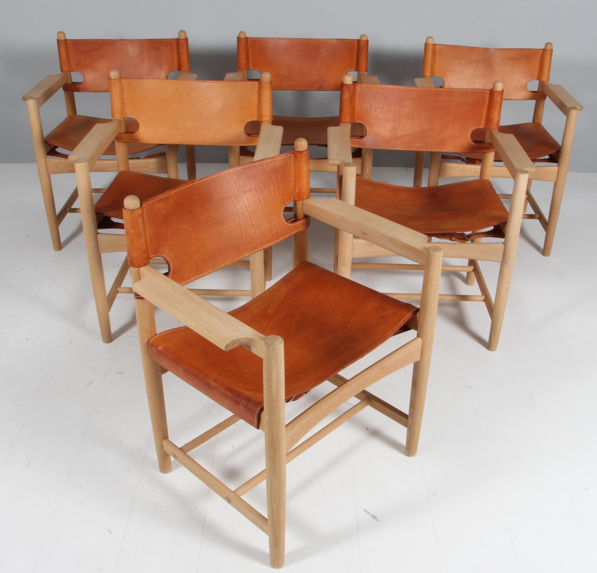 Børge Mogensen for Fredericia Stolefabrik, set of 6 armchairs model 3238, in oak and leather, Denmark, 1964.

Set of six armchairs in solid oak. These chairs remind of the classical foldable 'director-chairs', yet this design by Danish designer