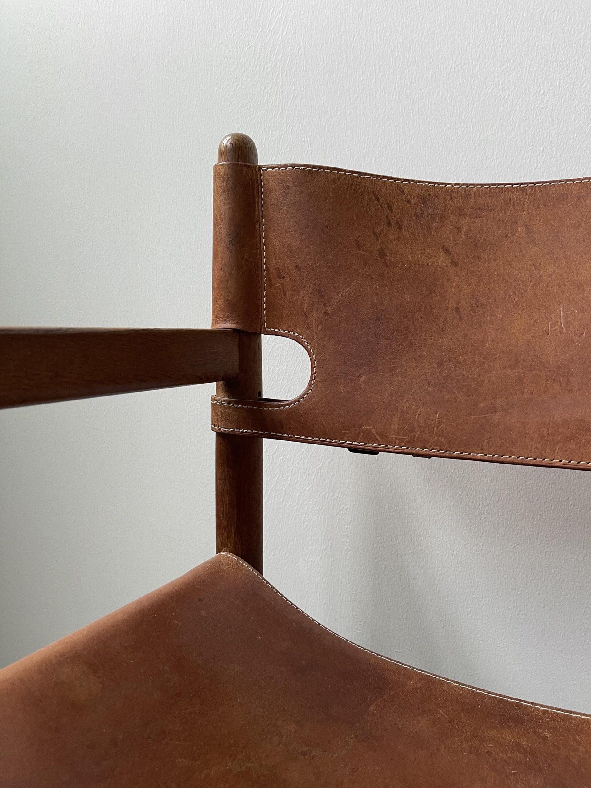 This model 3238 was designed in 1958, and is a variation of Mogensen’s famous Spanish Chair. The seat and back of these chairs can be tightened as required. The oak frames have original saddle leather backs and seats with contrast stitching. 

This