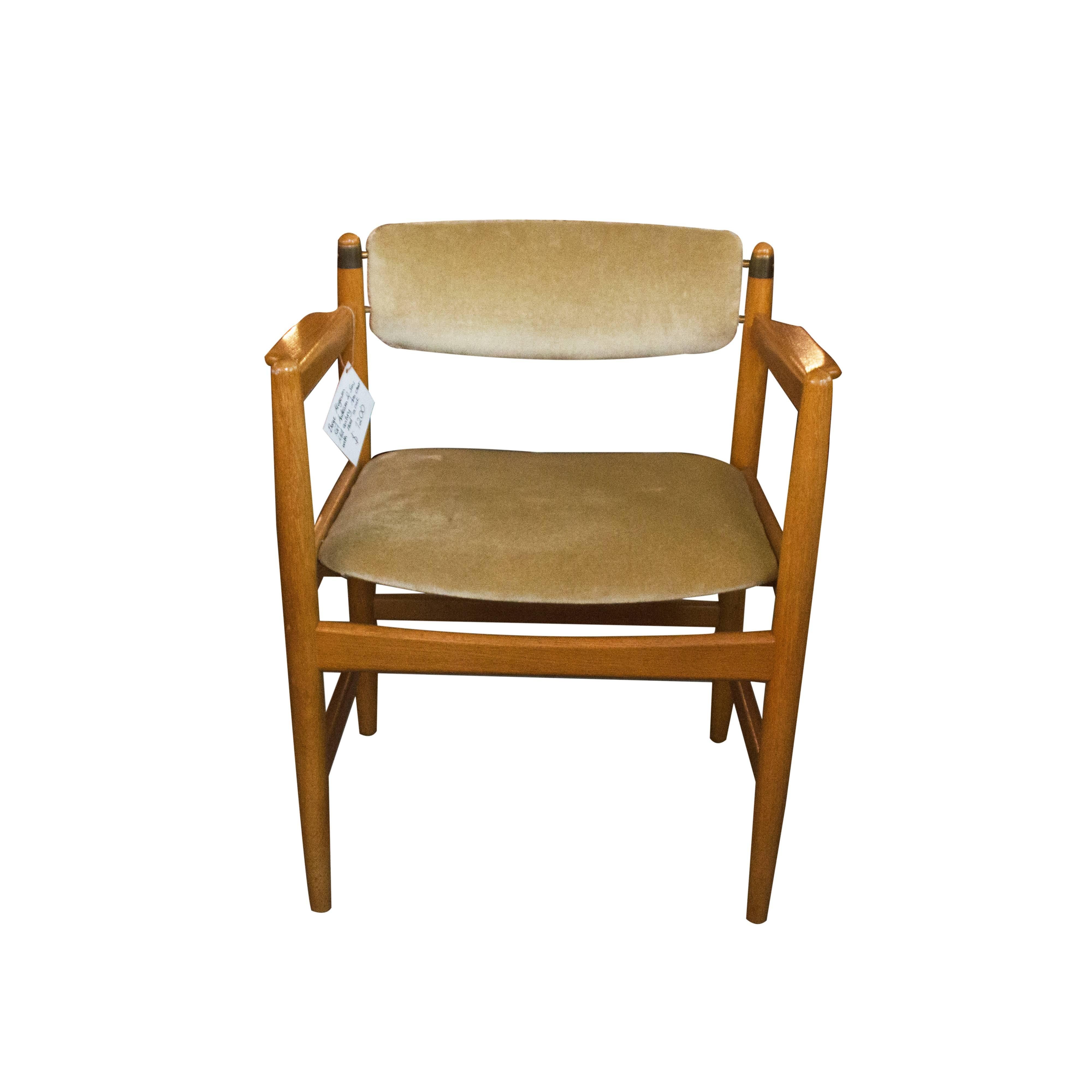 Stunning lounge chair with beautifully carved arm rests with brass details. The fabric is not original and can be changed to your favourite look, why not leather?

Børge Mogensen (Denmark, 1914-1972)
Among the great mid-20th century Danish
