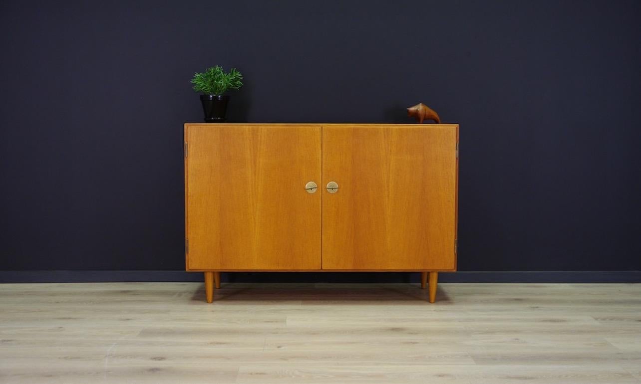 Cabinet from 1960s-1970s, Danish design - timeless design by Børge Mogensen. Form made for FDB Møbler. Surface veneered with ash. Roomy interior with shelves and drawers behind the opening doors. Characteristic keys that function as handles.