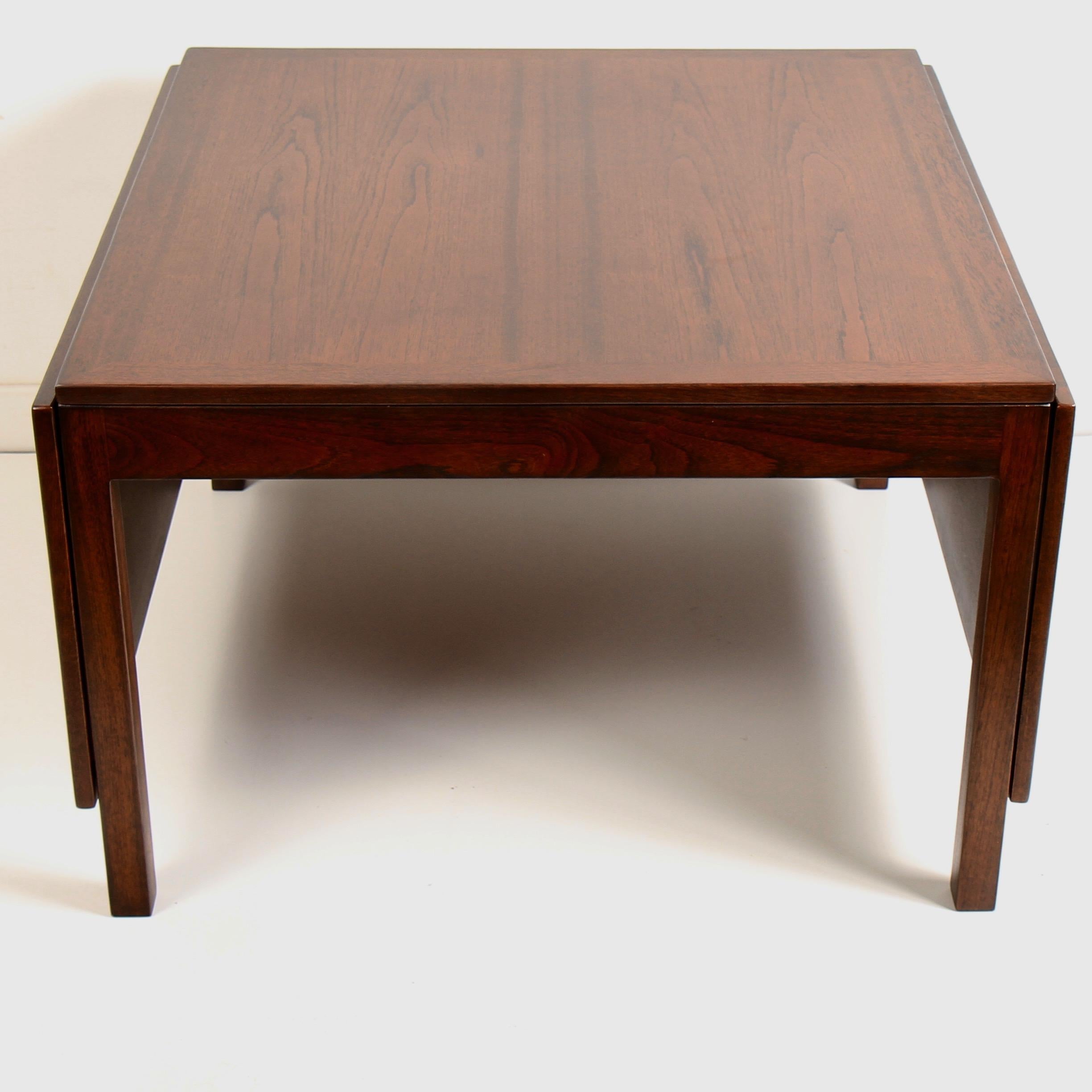 Rare drop teak leaf coffee table by Børge Mogensen for Fredericia Stolefabrik. Professionally refinished (first time) to the original walnut finish. This is a practical coffee table for small spaces that can expand for entertaining extra company.