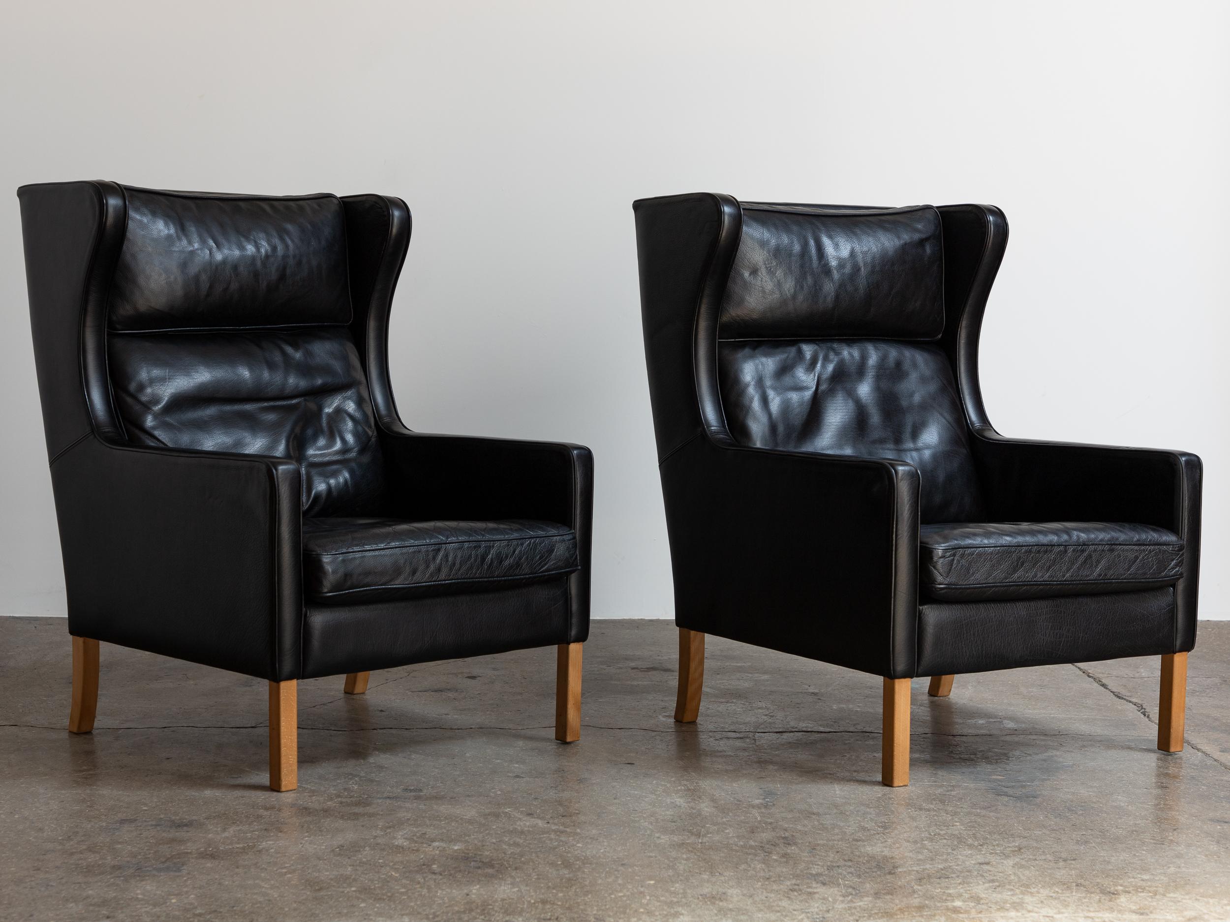 Pair of Model 2204 lounge chairs, designed by Børge Mogensen for Fredericia. Originally designed in the 1960s as a modern collection utilizing traditional craftsmanship, this leather seating has become a Danish modern staple. Stately and refined,